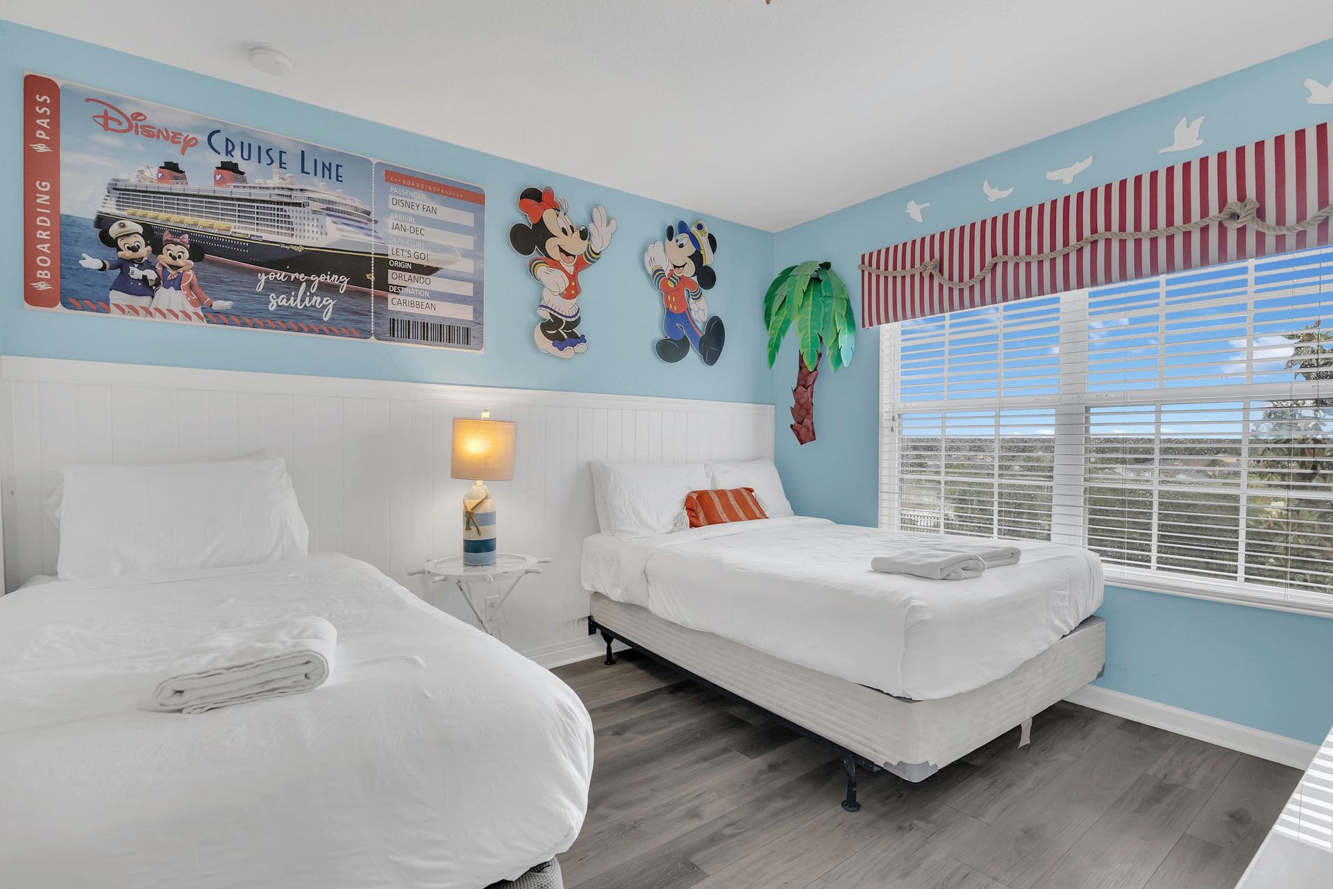 Cheerful blue room with twin beds, perfect for any young guest. 
