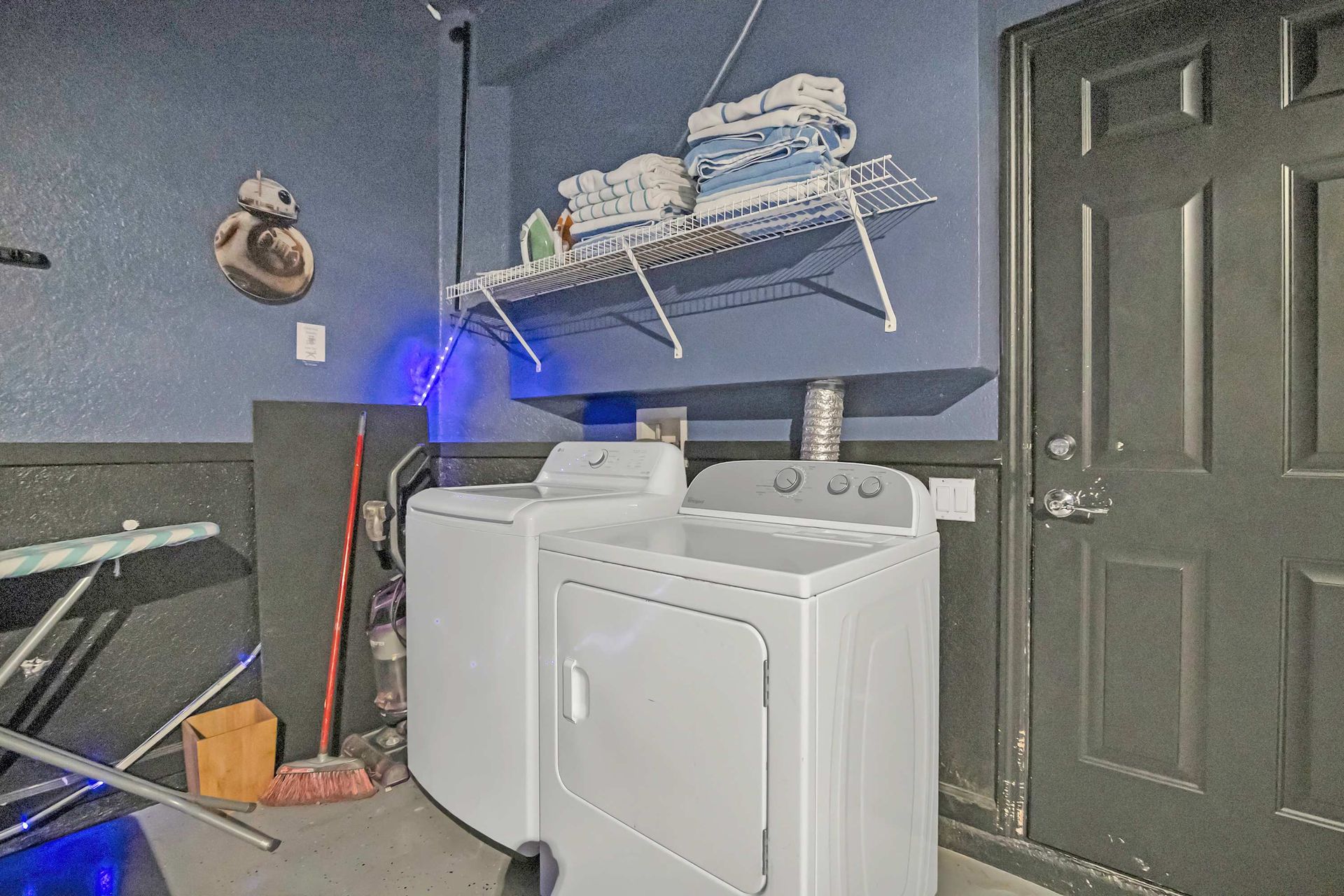 Full-size washer and dryer with extra shelving for all your needs. 