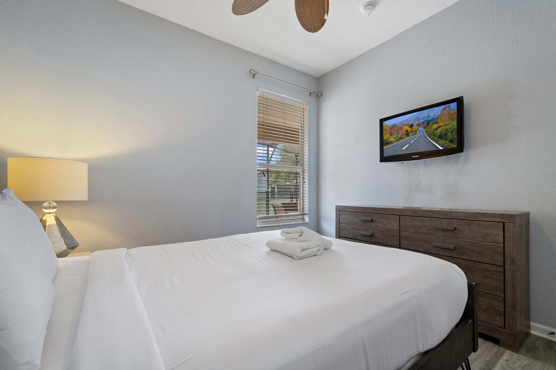 Cozy king bedroom with modern décor, natural light, and a peaceful vibe
