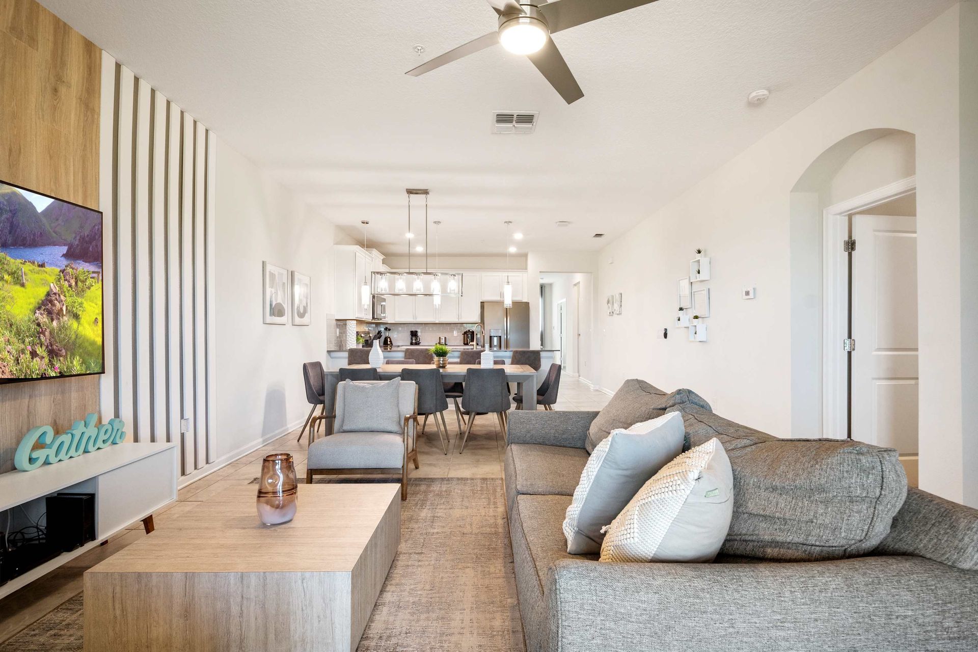 Stylish lounge flows to the modern dining and kitchen. Bright open-plan.