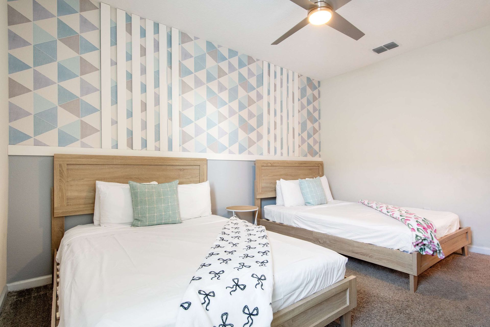 Spacious room with two comfy queen beds, perfect for a family.