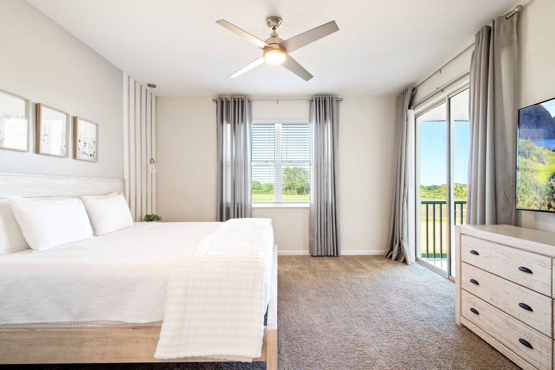 Plush King bed and private patio for enjoying the view and breeze.