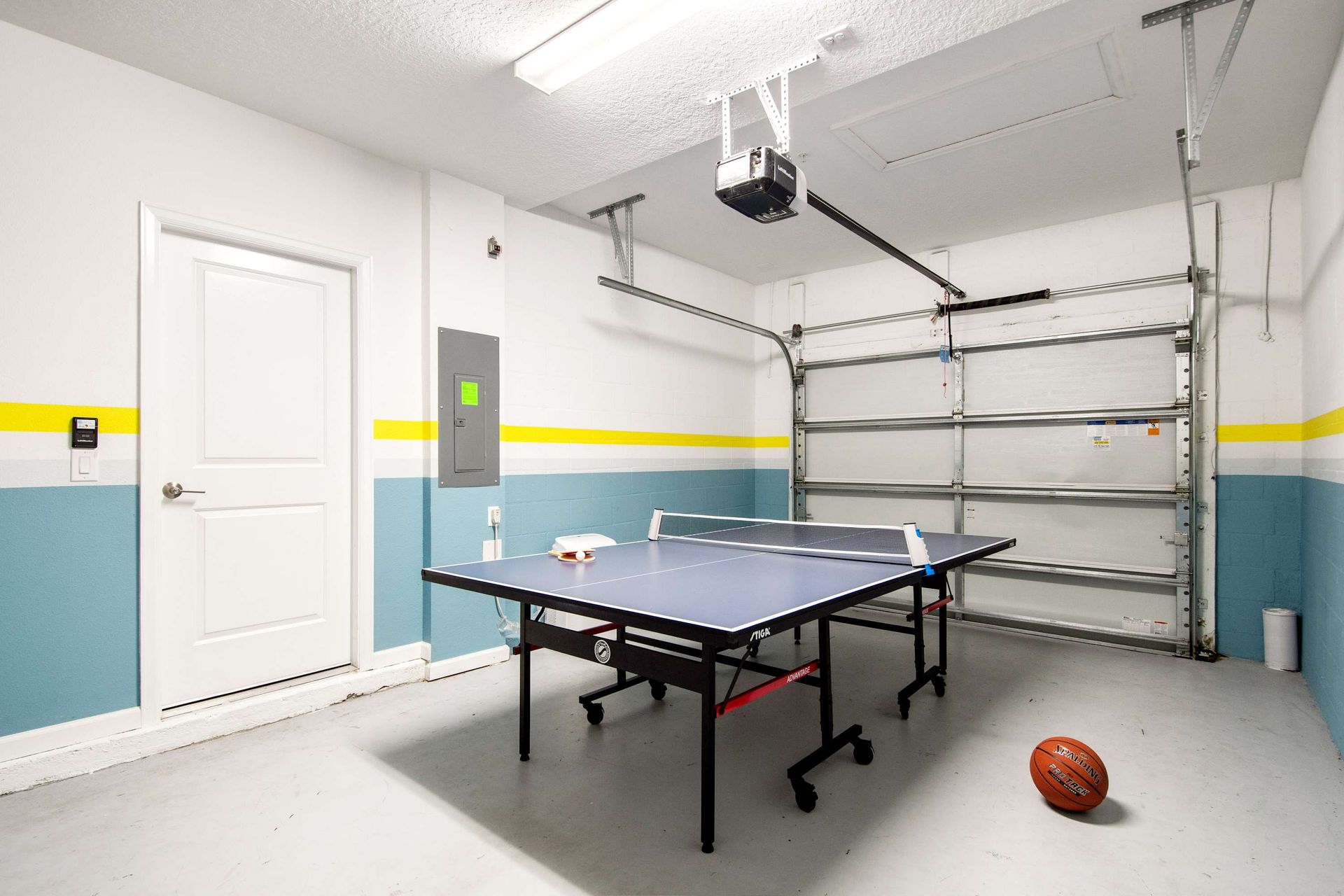 Game On! Dedicated ping pong table in a bright, colorful game room.