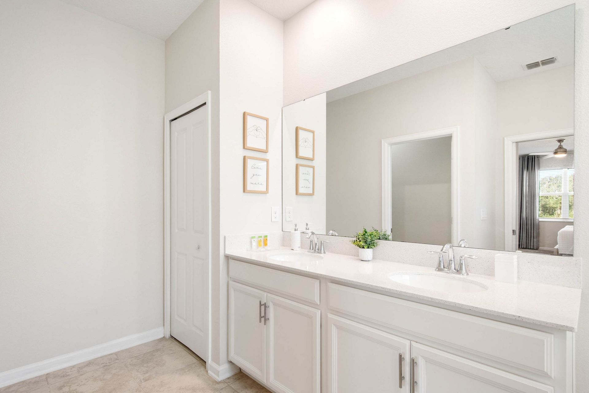 Master bath: dual vanity, soaking tub, and glass walk-in shower.
