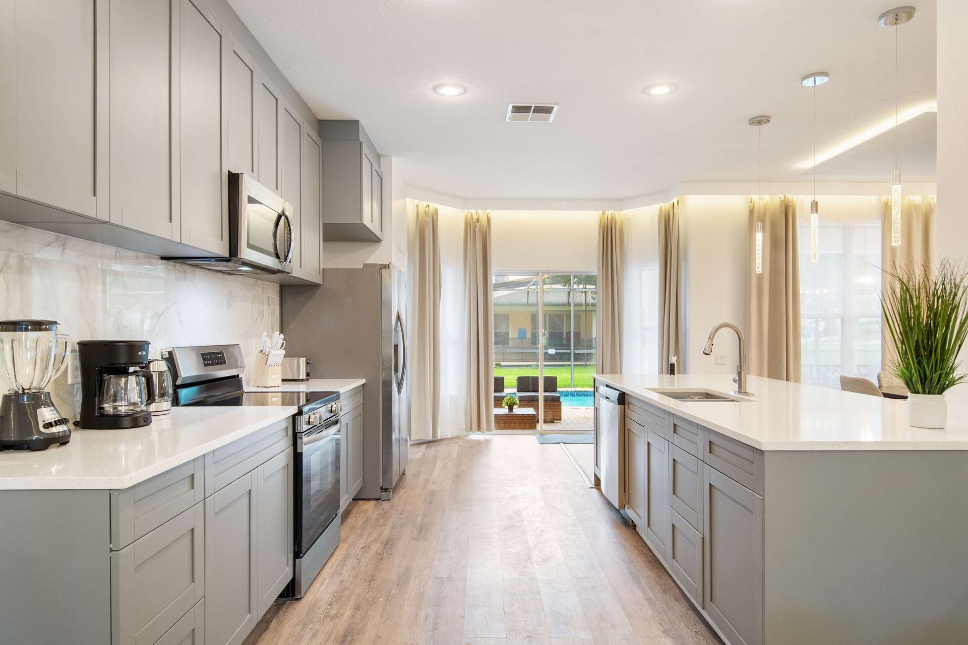 Fully stocked with modern appliances and group-sized cookware