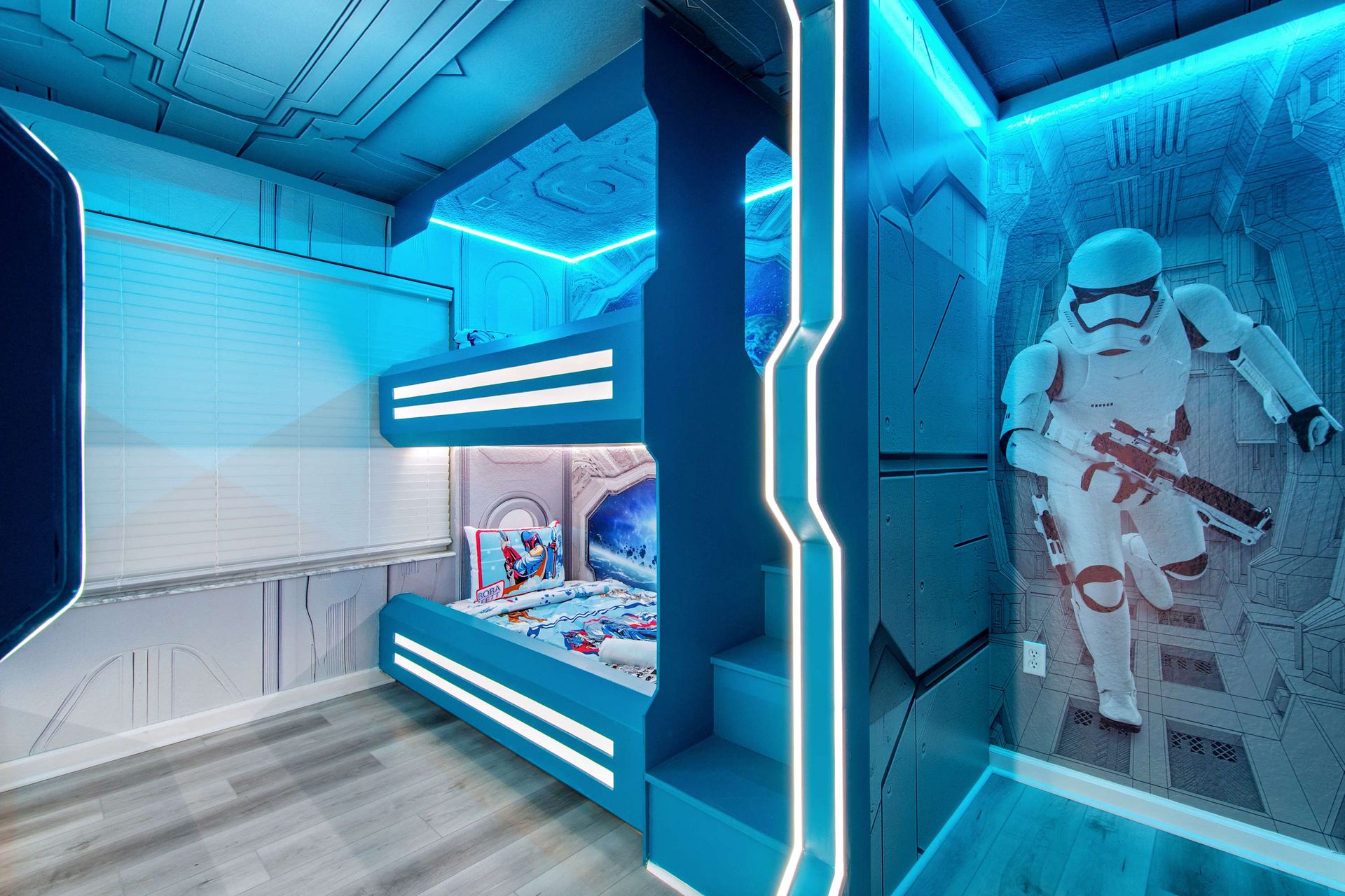 Sleep like a Jedi in twin-over-twin bunk beds under a galactic mural