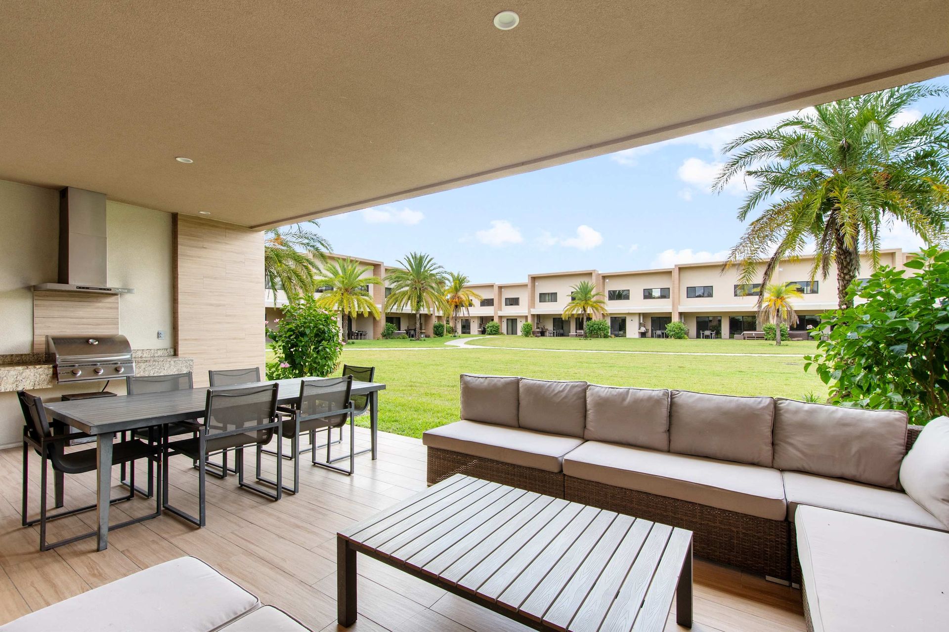 Twin comfort: sleek beds, velvet headboards, and plush white linens.