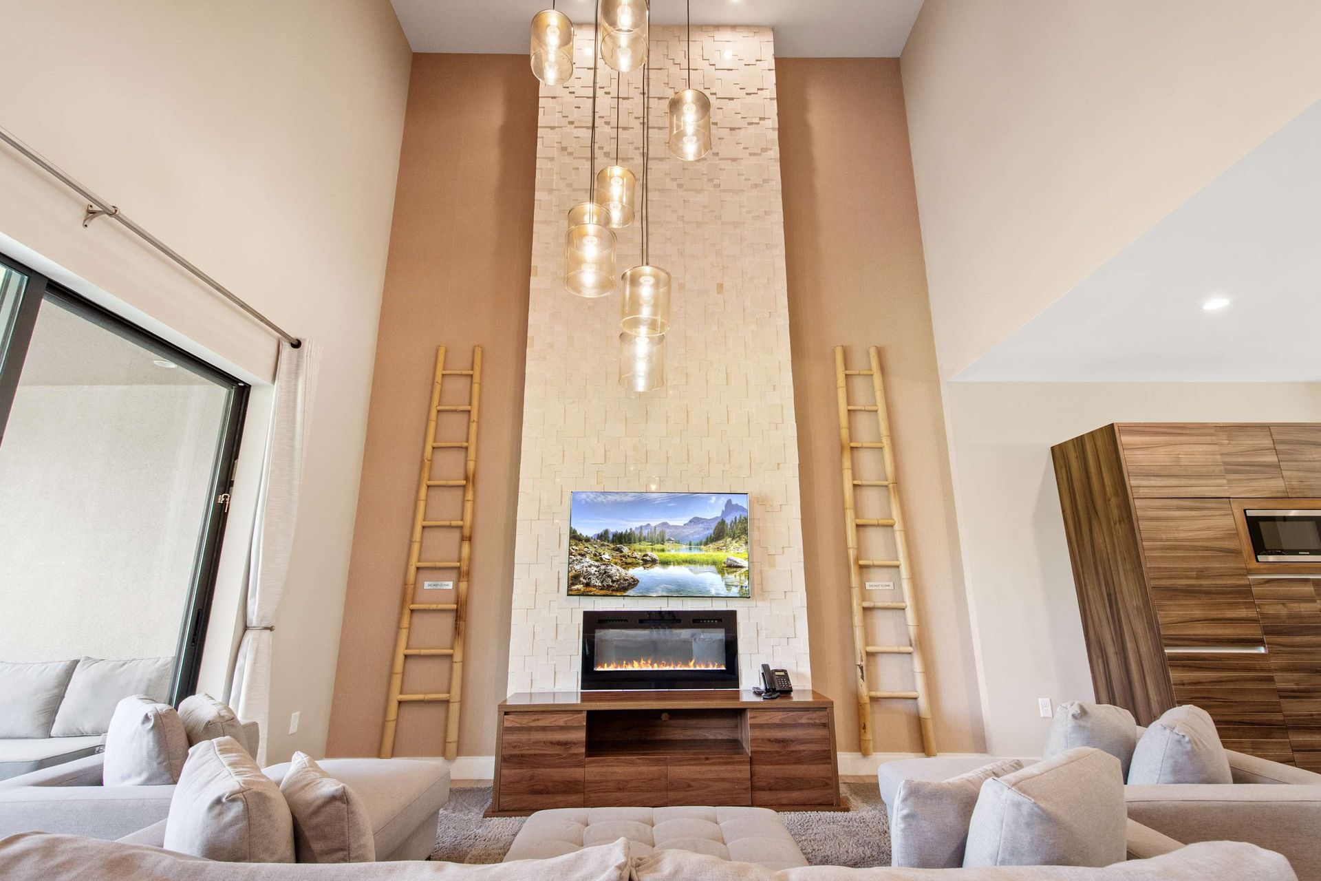 Comfortable twin beds with plush headboards and crisp white linens.