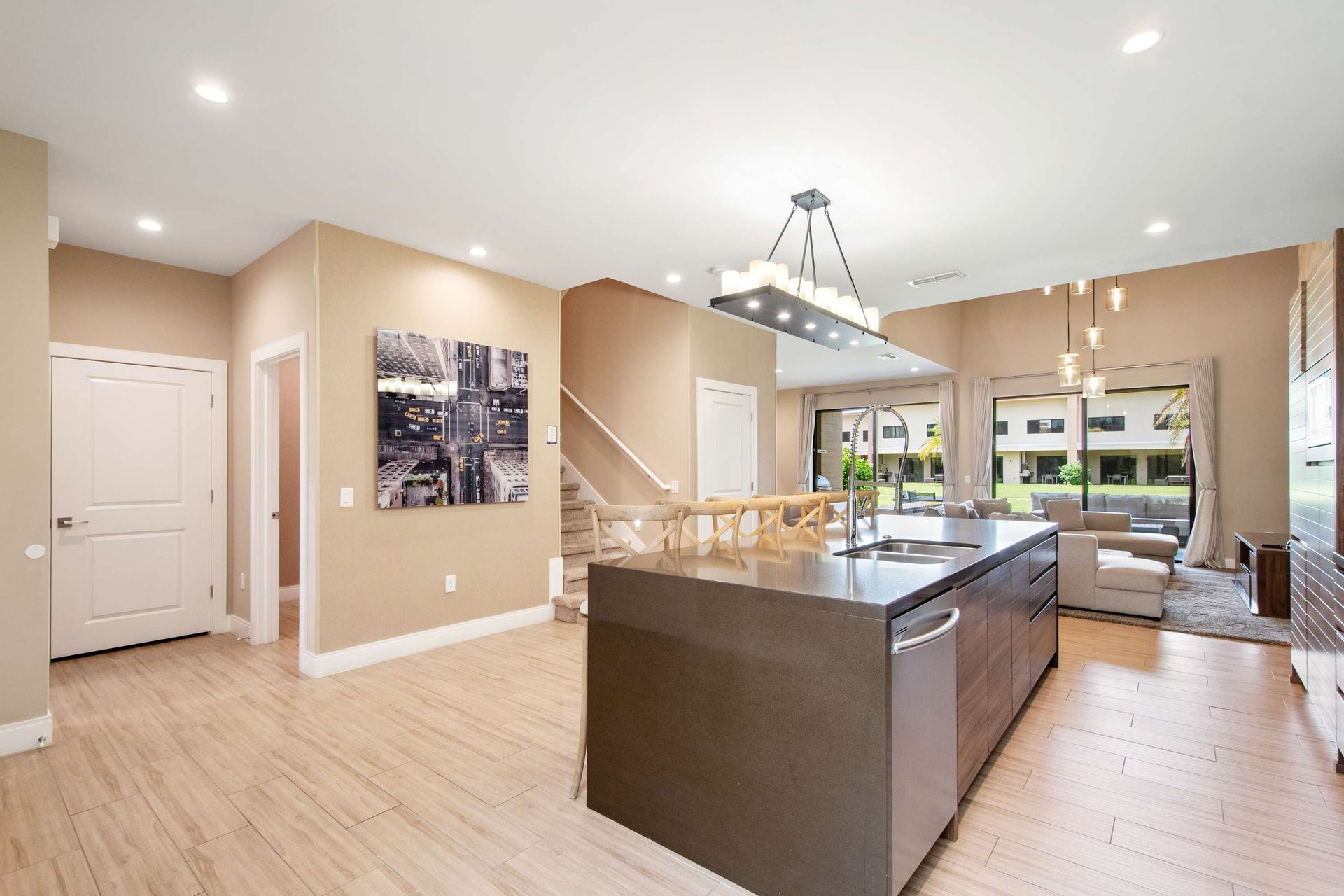Open-concept living: dramatic kitchen island flows to the lounge area.