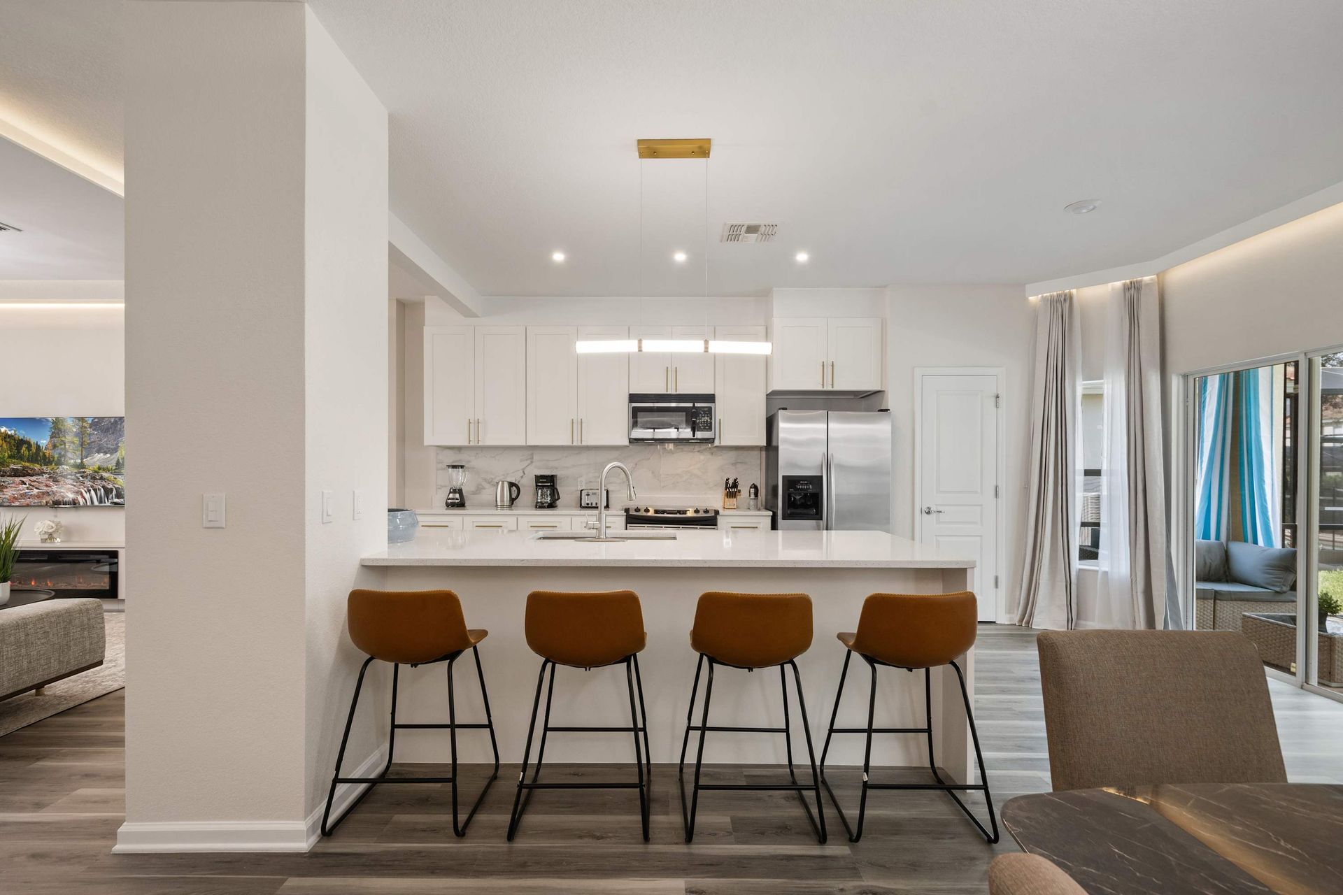 Bright, open kitchen with a four-seat breakfast bar.