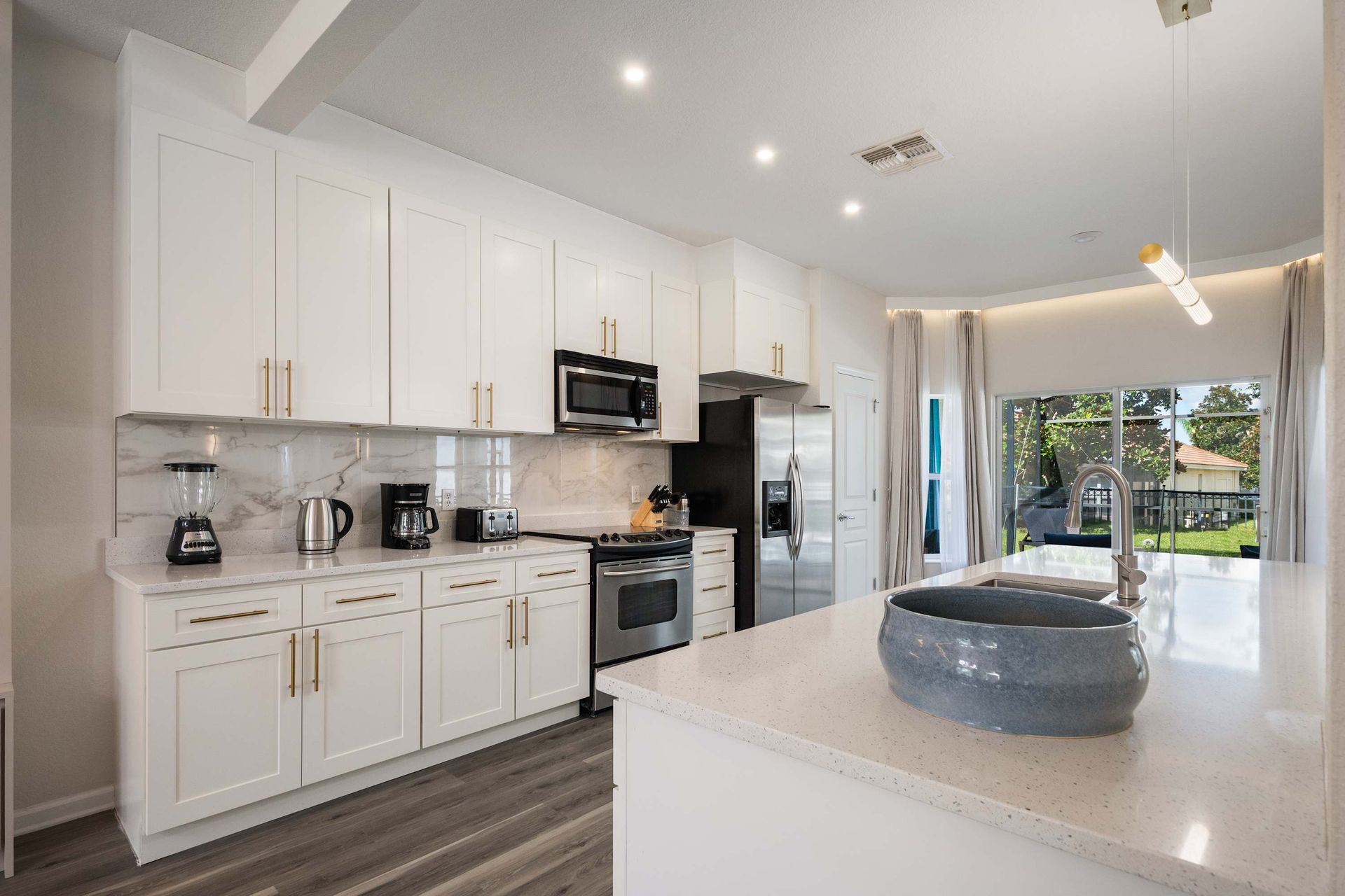 Fully equipped, bright, modern kitchen with plenty of counter space.