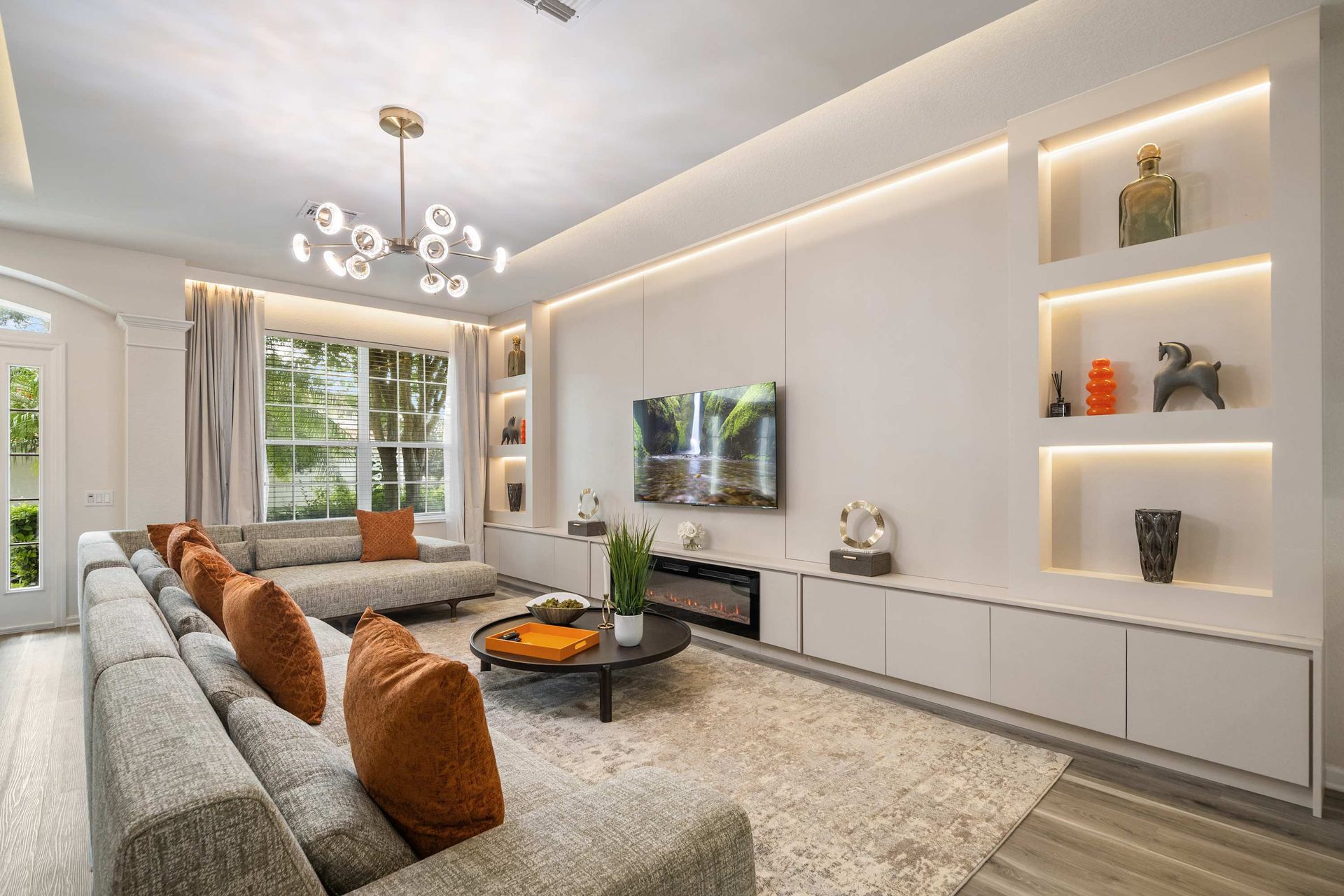 Modern luxury: clean lines, bold art, and perfect lighting.