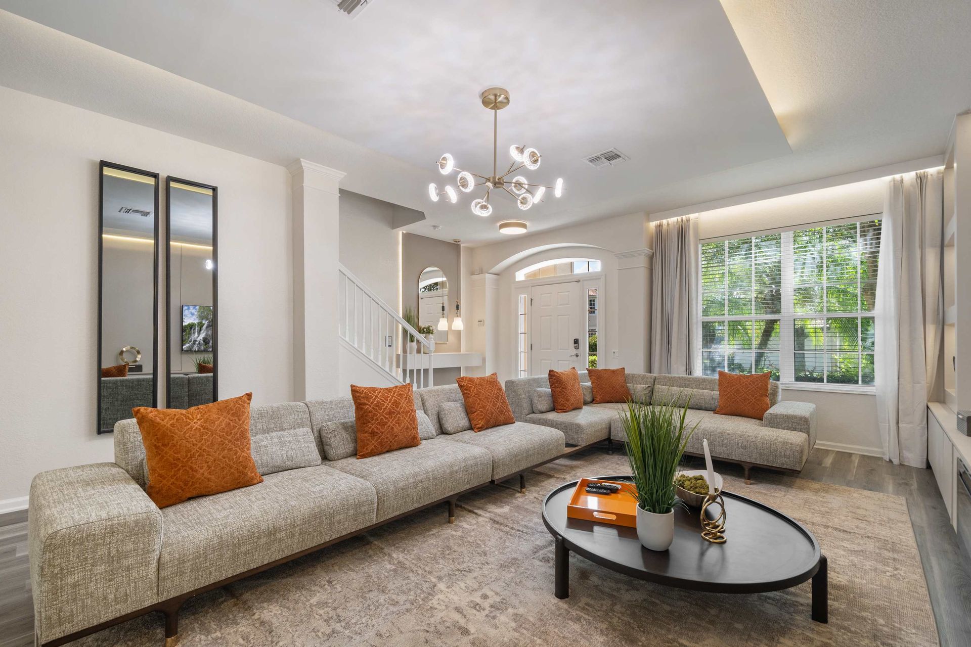 Expansive living room with stylish comfort and modern flair.