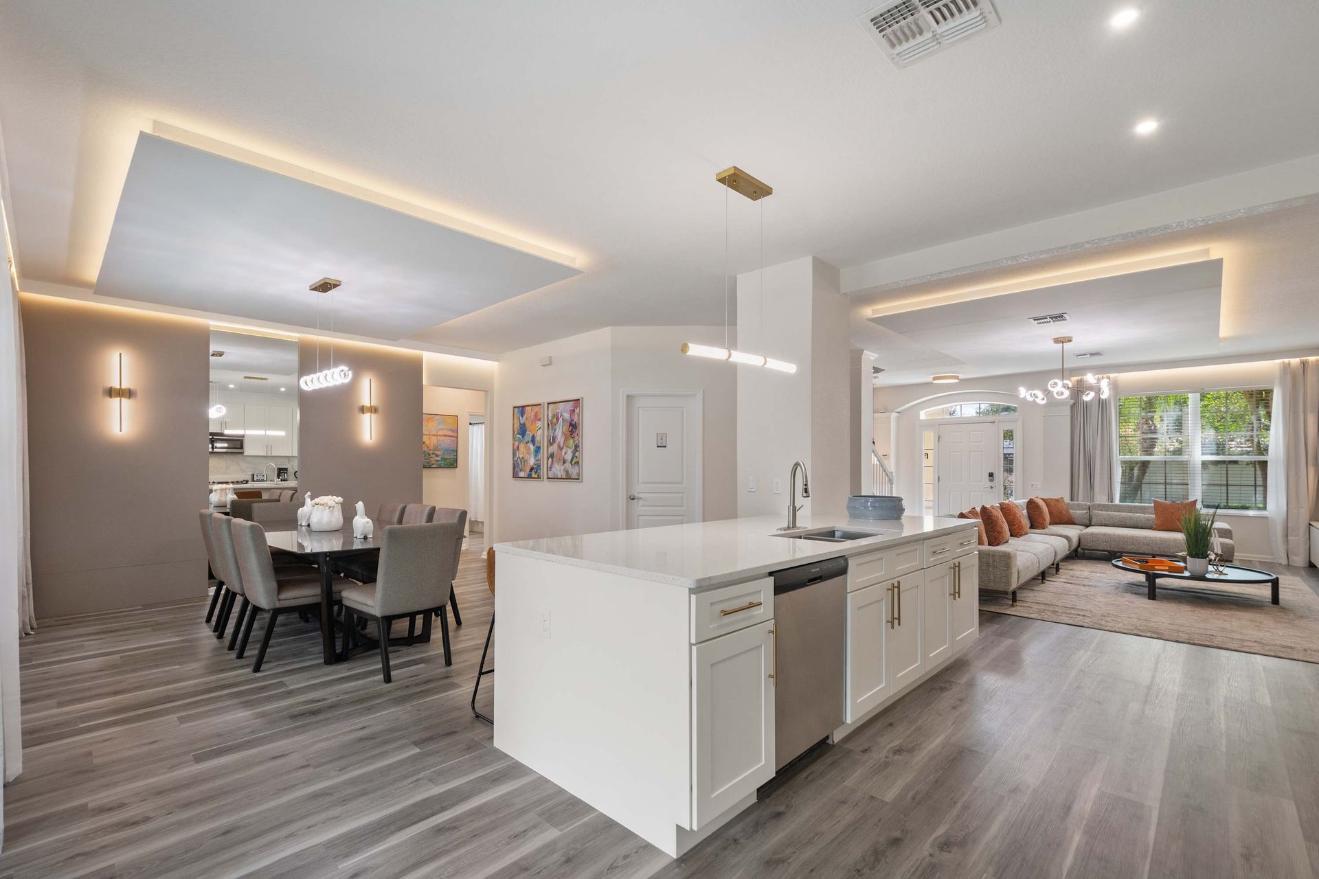 Bright, elegant space connecting kitchen, dining, and lounge.