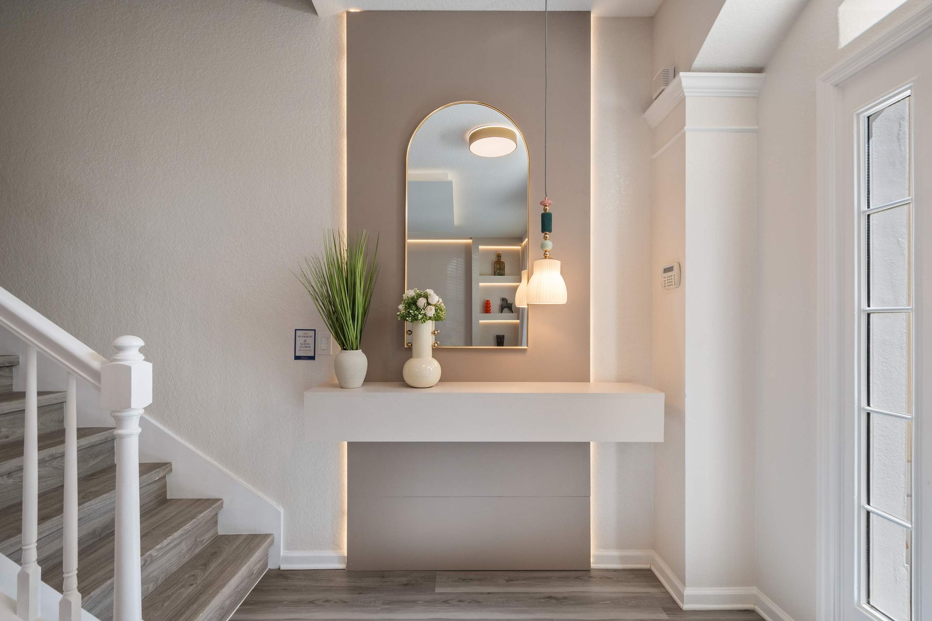 Chic entry vignette: modern, light, and perfectly styled.