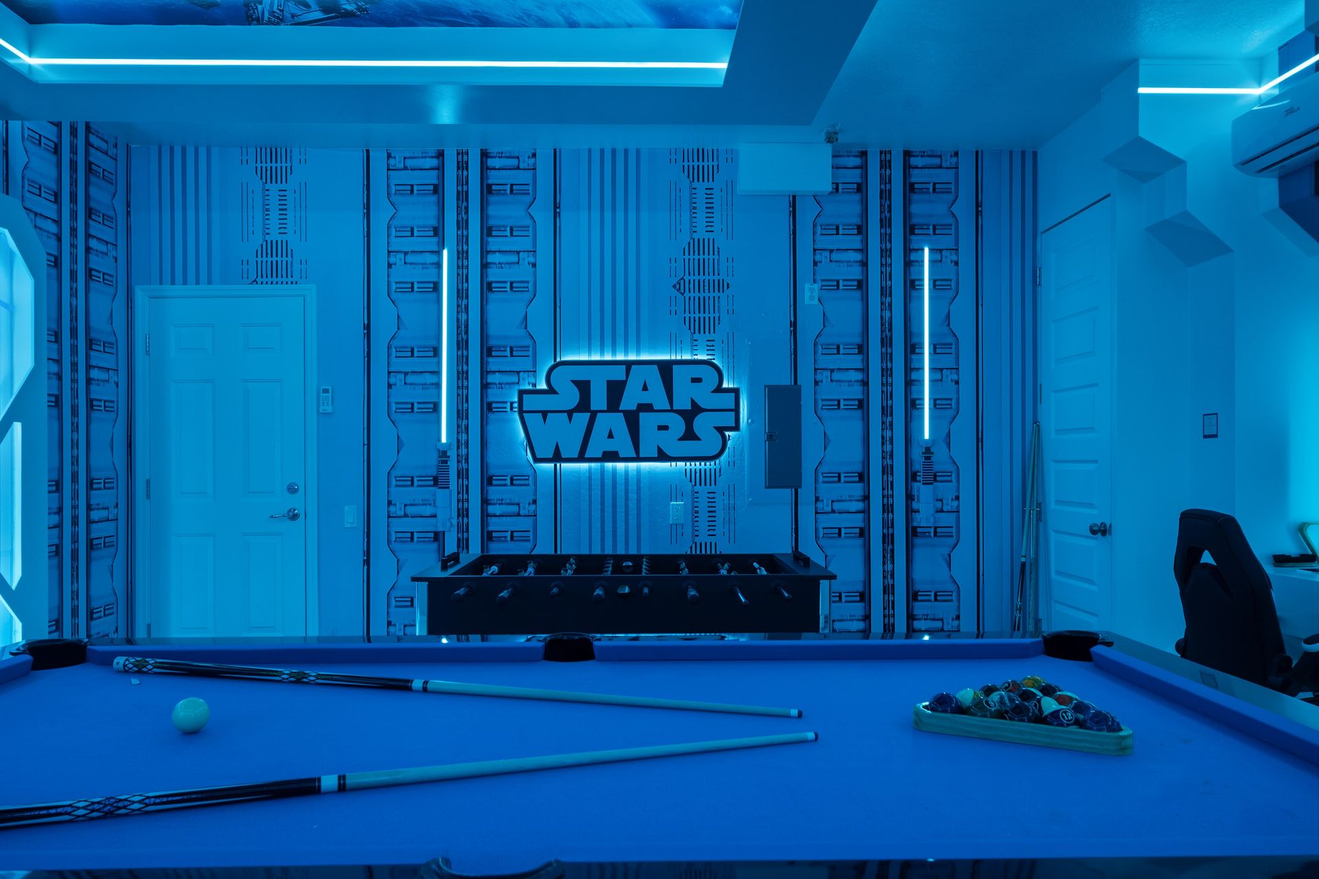 Pool, foosball, and an epic STAR WARS wall.