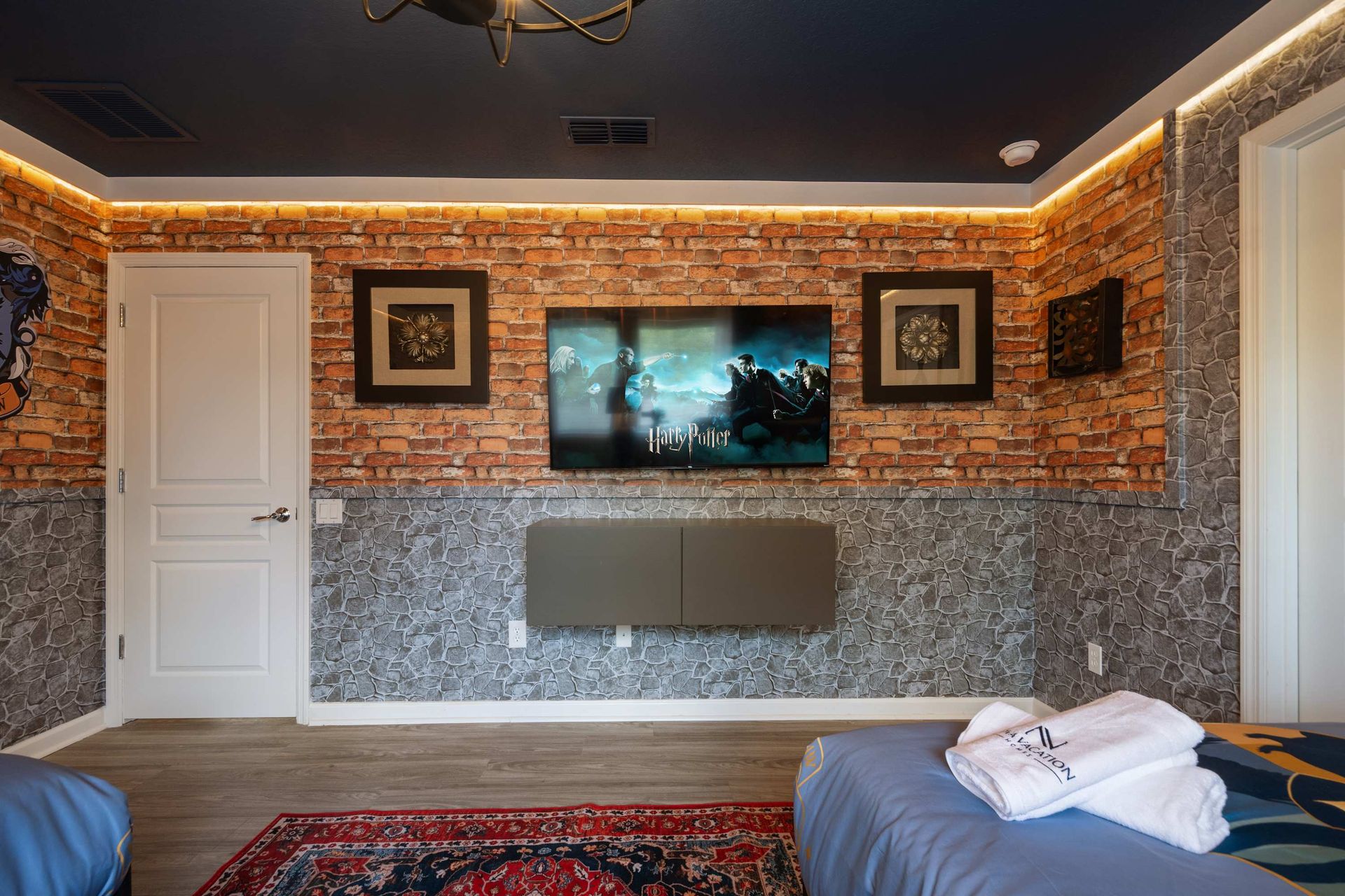 Cozy, themed room for movie night with warm accent lighting.