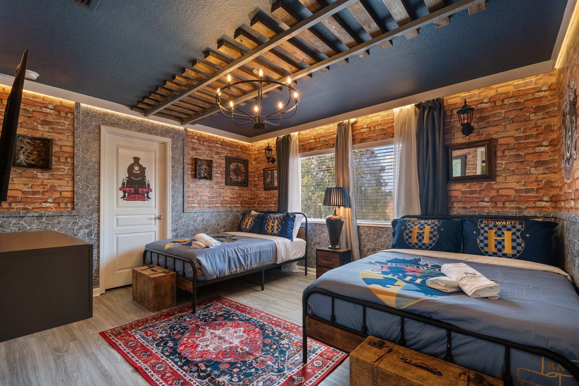 Themed twin bedroom with brick walls and rustic charm.