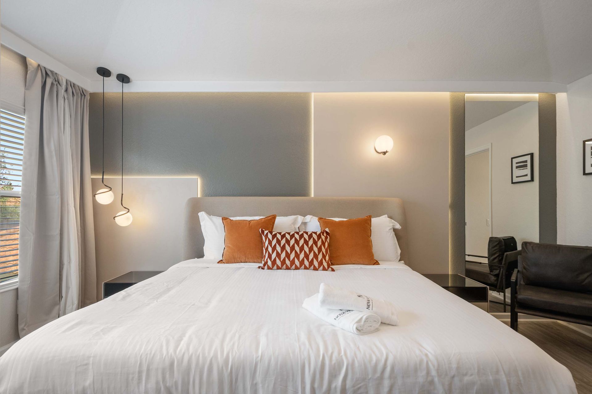 Chic, contemporary bedroom with perfect mood lighting.