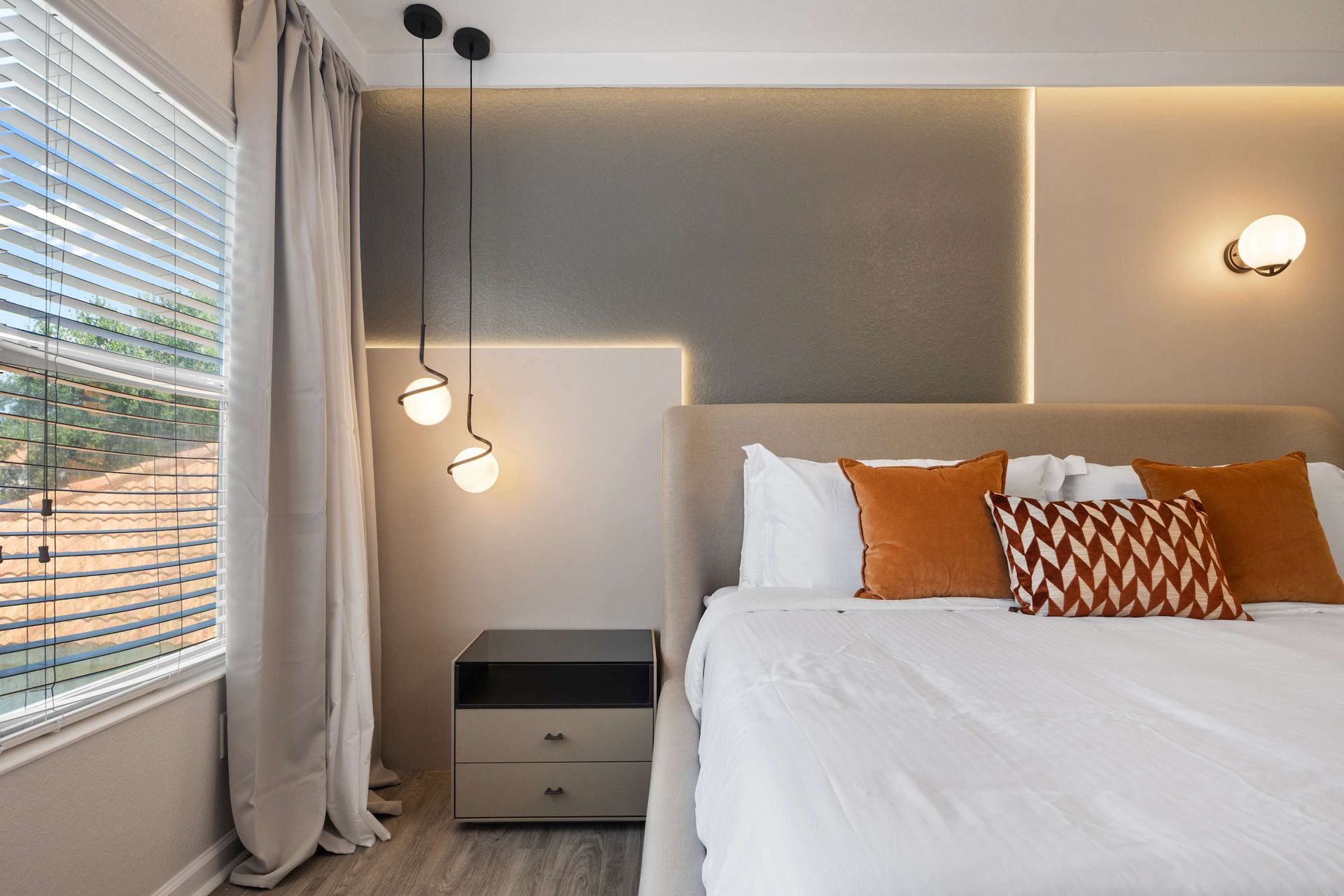 Chic, contemporary bedroom with perfect mood lighting.