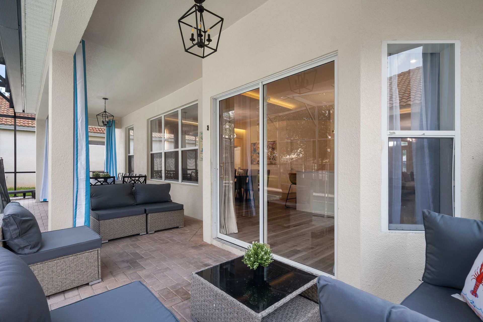 Outdoor lounge and dining areas protected from the sun for day use.