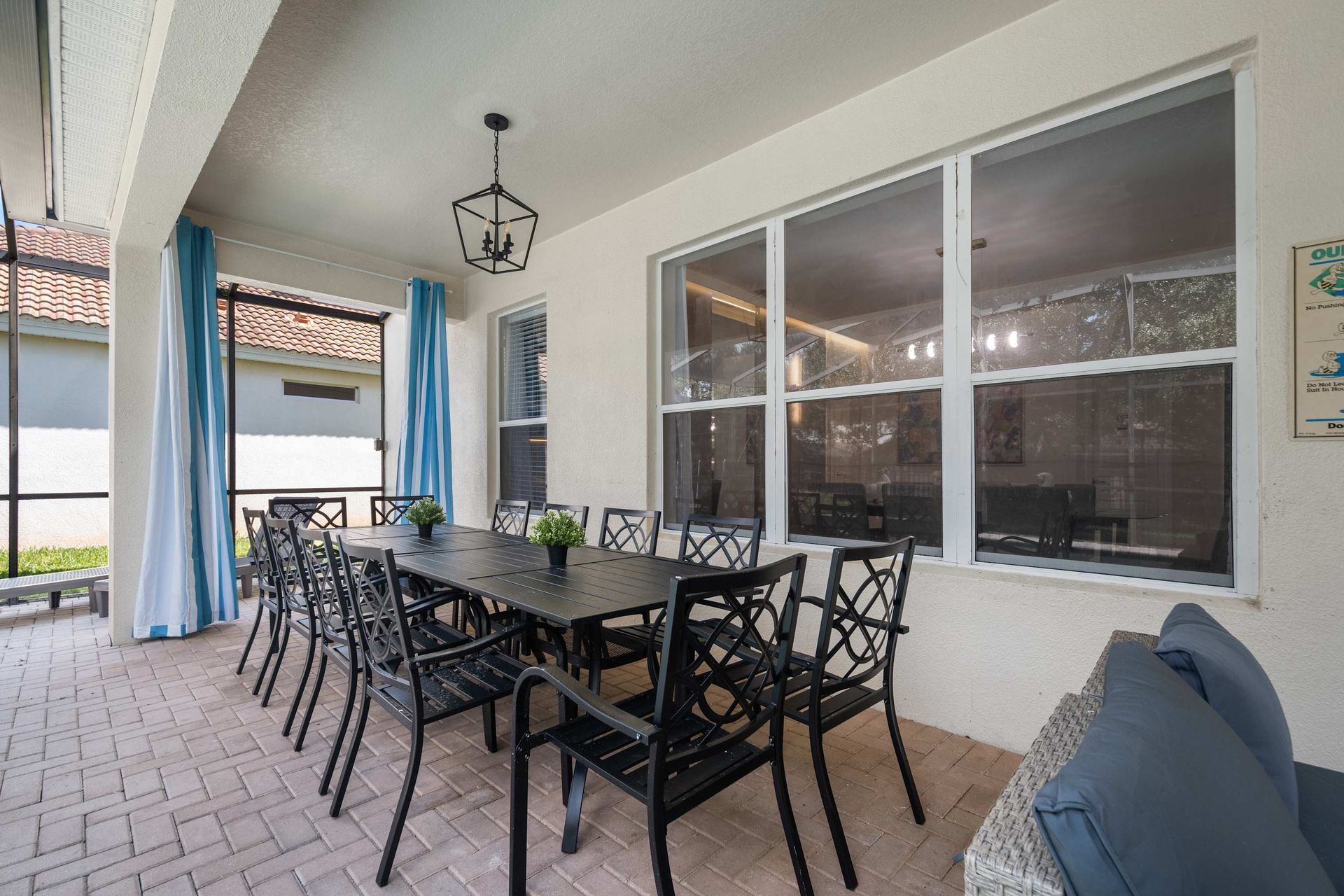 Covered patio dining for ten, perfect for outdoor meals and parties. 