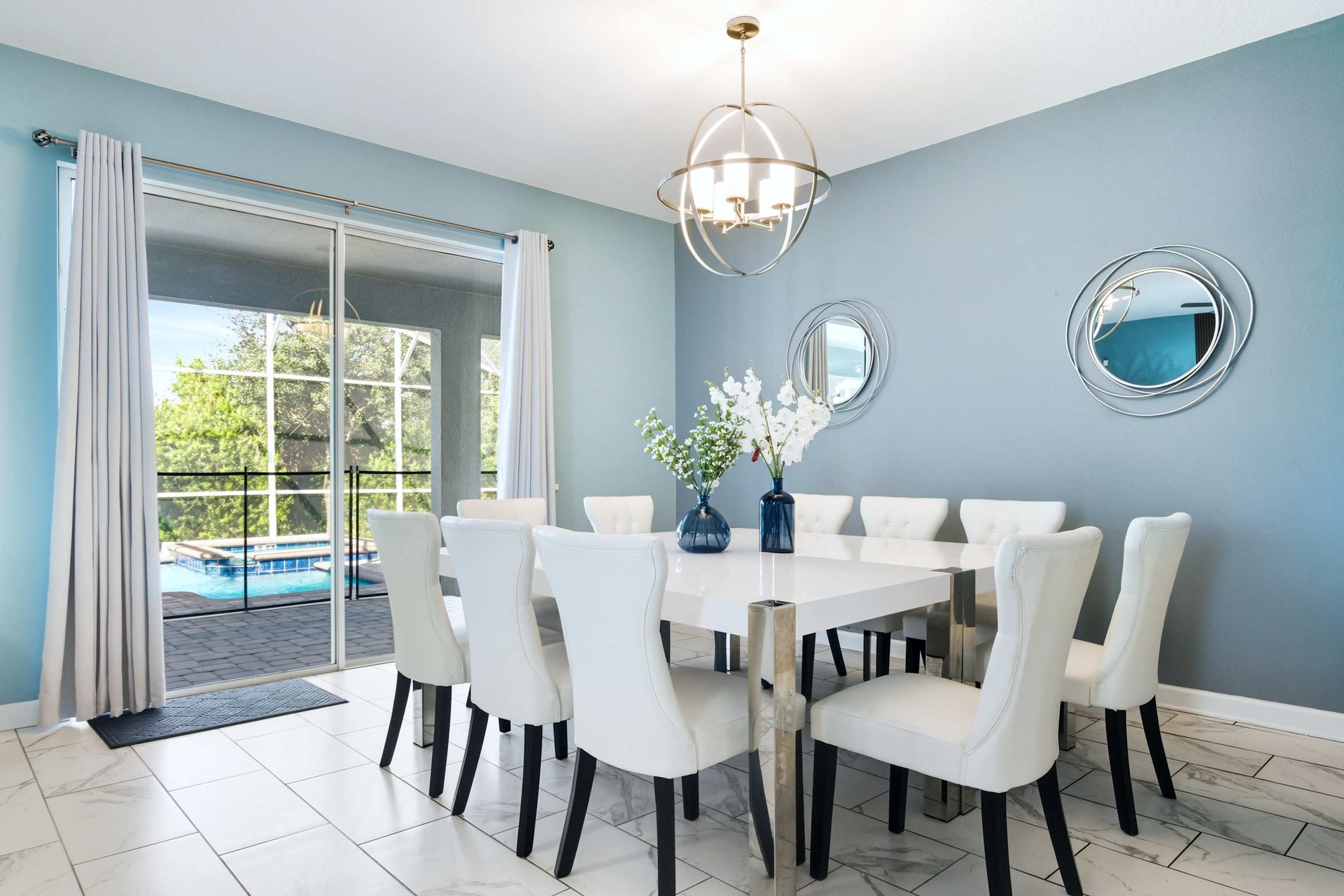 Stylish dining room with direct access to the pool patio.