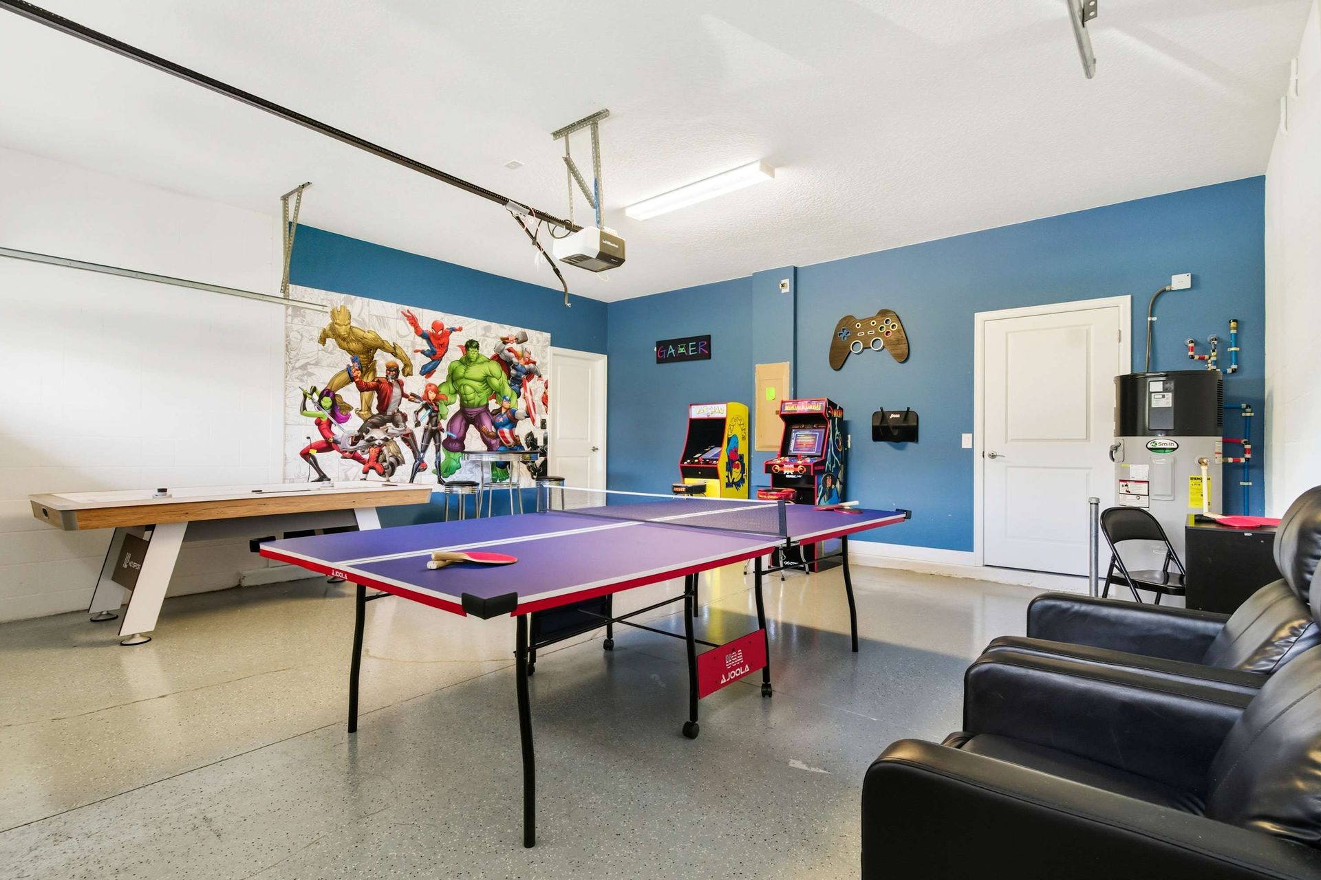 Game Room Ping pong and arcade fun in a vibrant superhero room!
