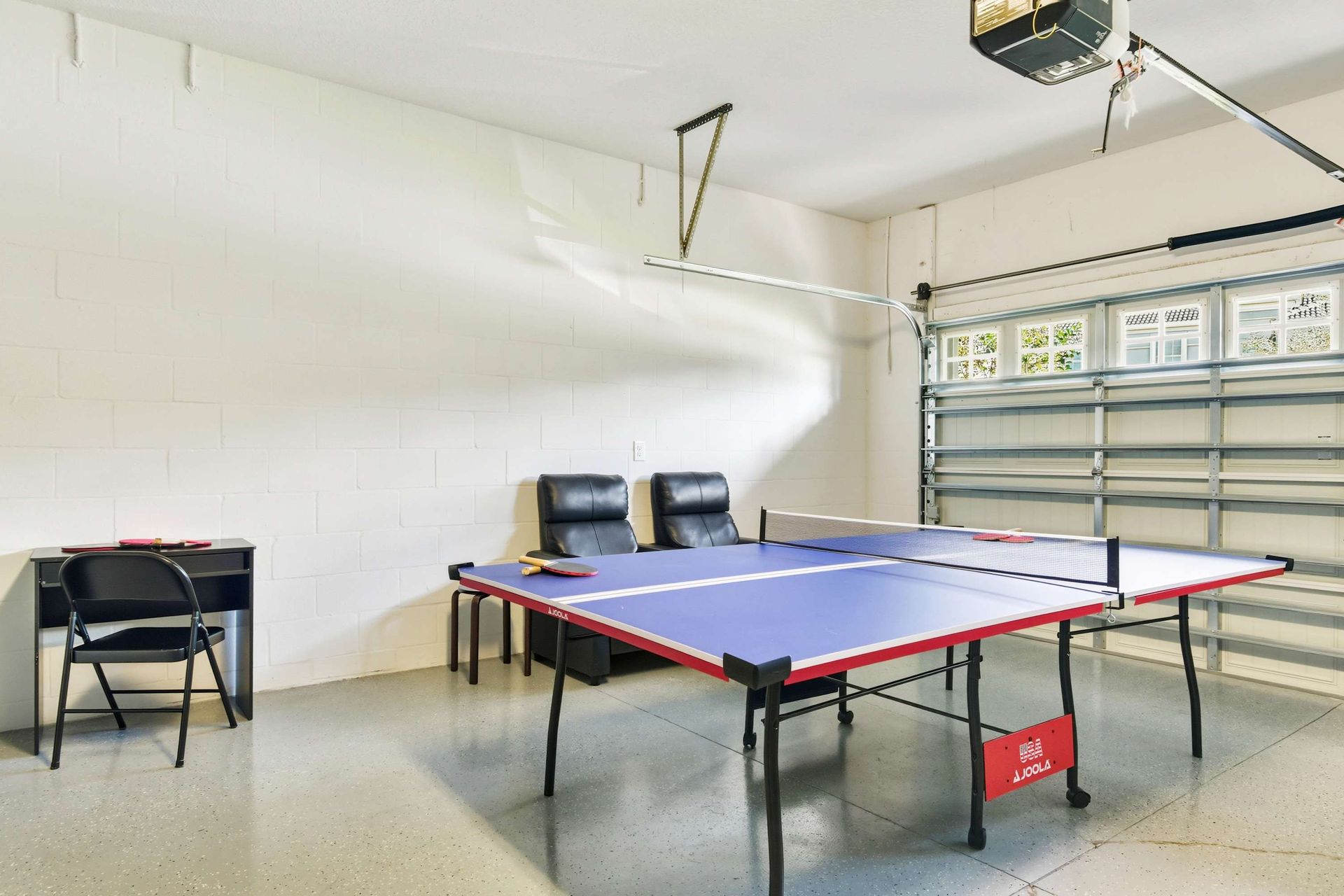 Ping pong, pool, and arcade fun in a vibrant superhero room!