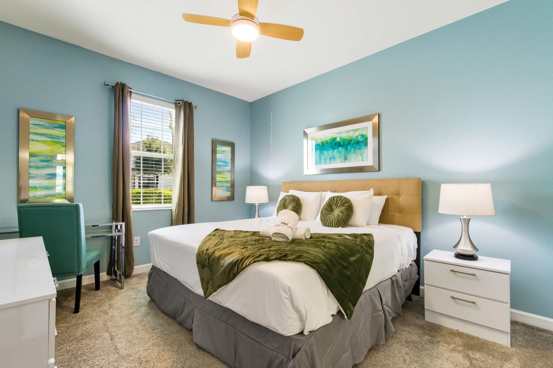 Luxurious King bed, bright design, and a flat-screen TV.