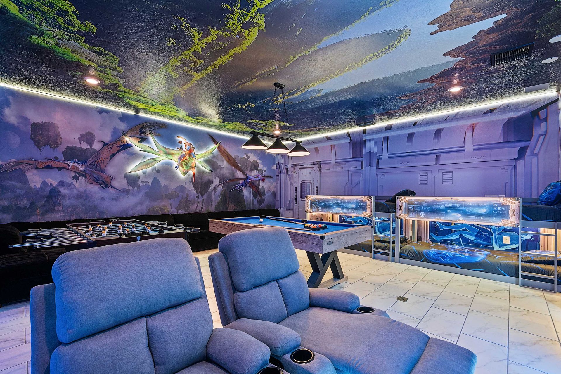 Immerse yourself in a stunning Avatar-inspired game room with glowing LED lights, pool table, foosball, and cozy lounge seating — a family-favorite entertainment hub near Disney!