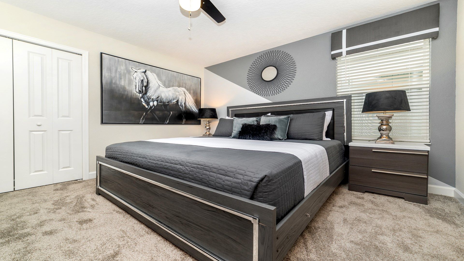 Cozy bedroom with a modern design, soft lighting, and luxurious bedding