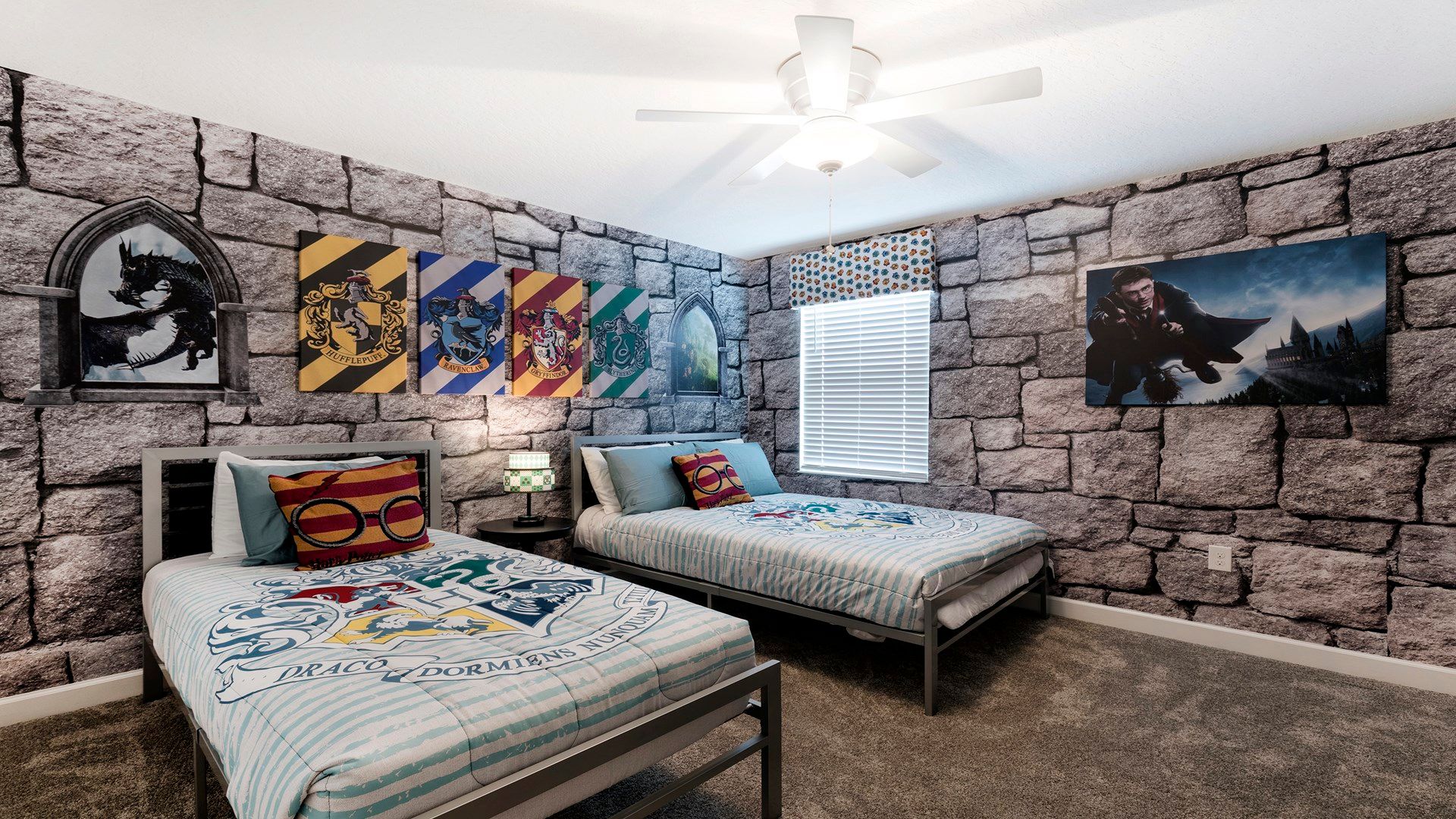 Magical Harry Potter-themed room with Hogwarts decor and cozy twin beds