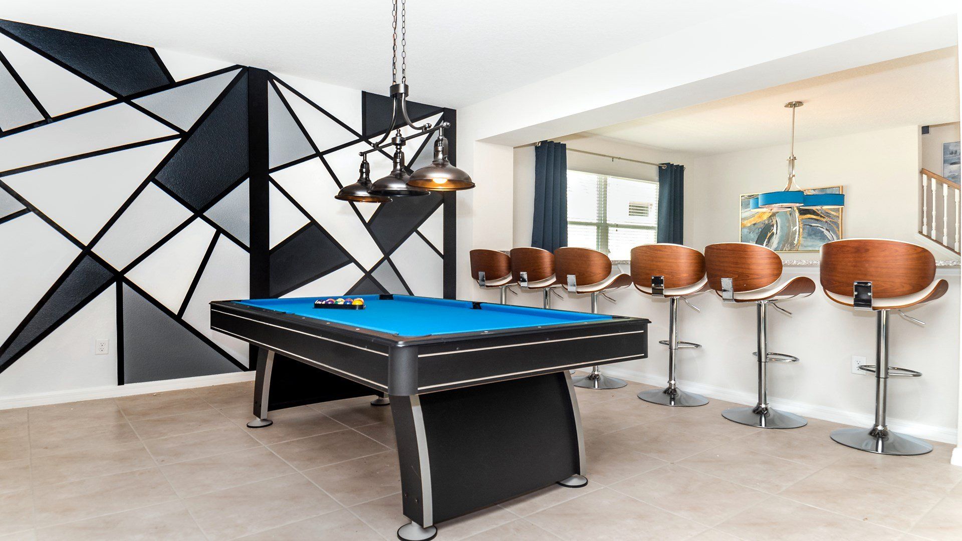 Elevate the leisure options in your space with the addition of a pool table.
