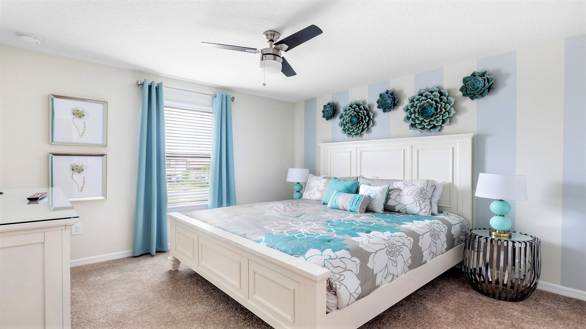Charming bedroom with floral decor, cozy king bed, and soft blue accents.