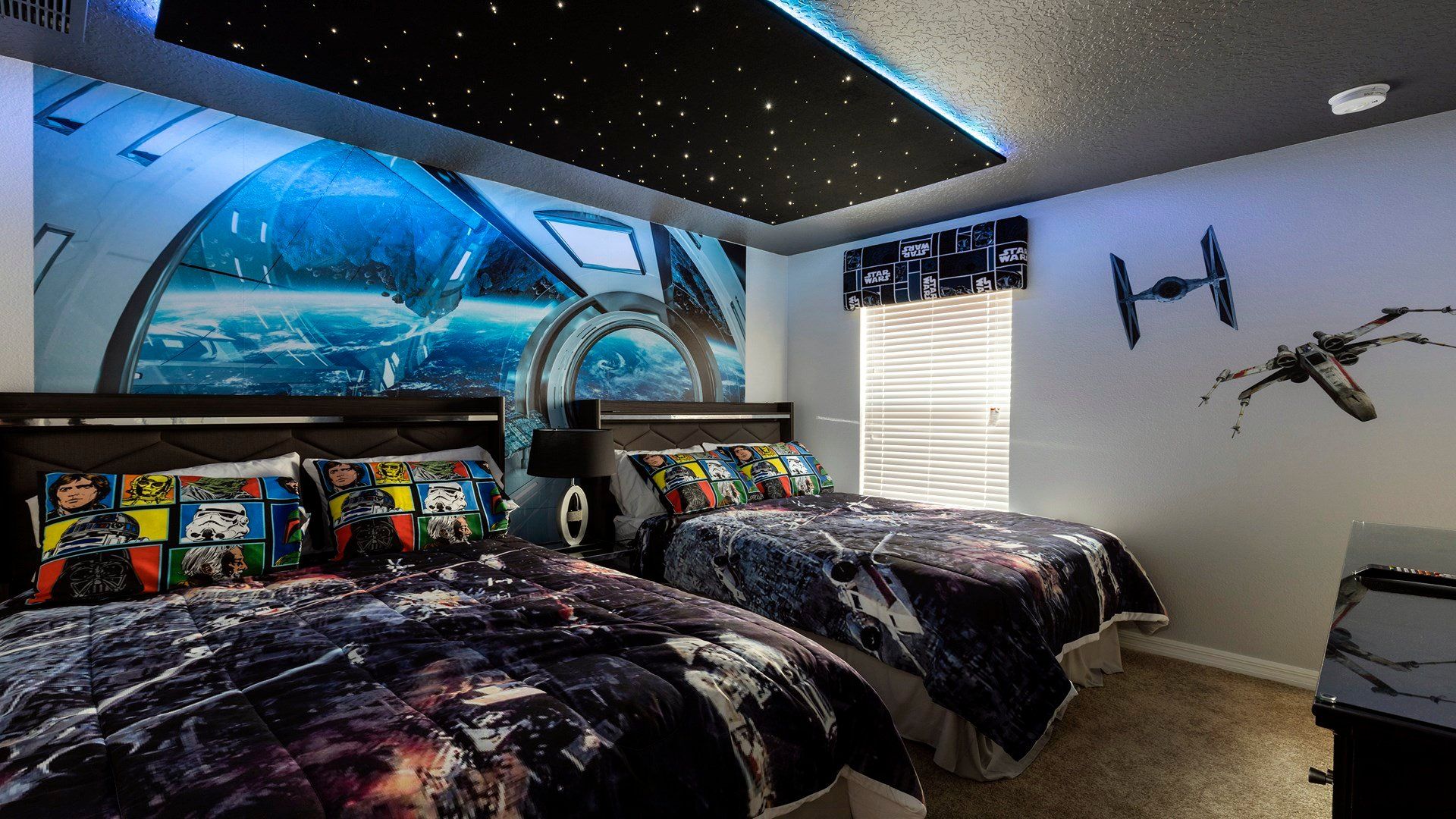 Kids will love the upstairs bedroom with a cool Star Wars theme.