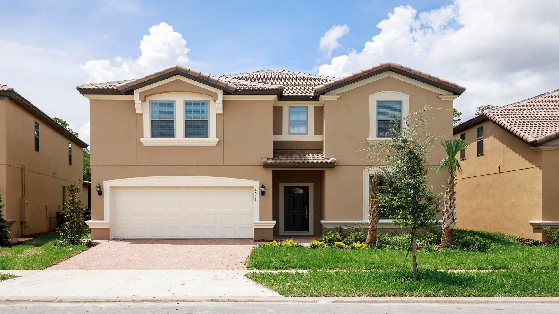 Spacious modern villa with a two-car garage and stunning curb appeal!