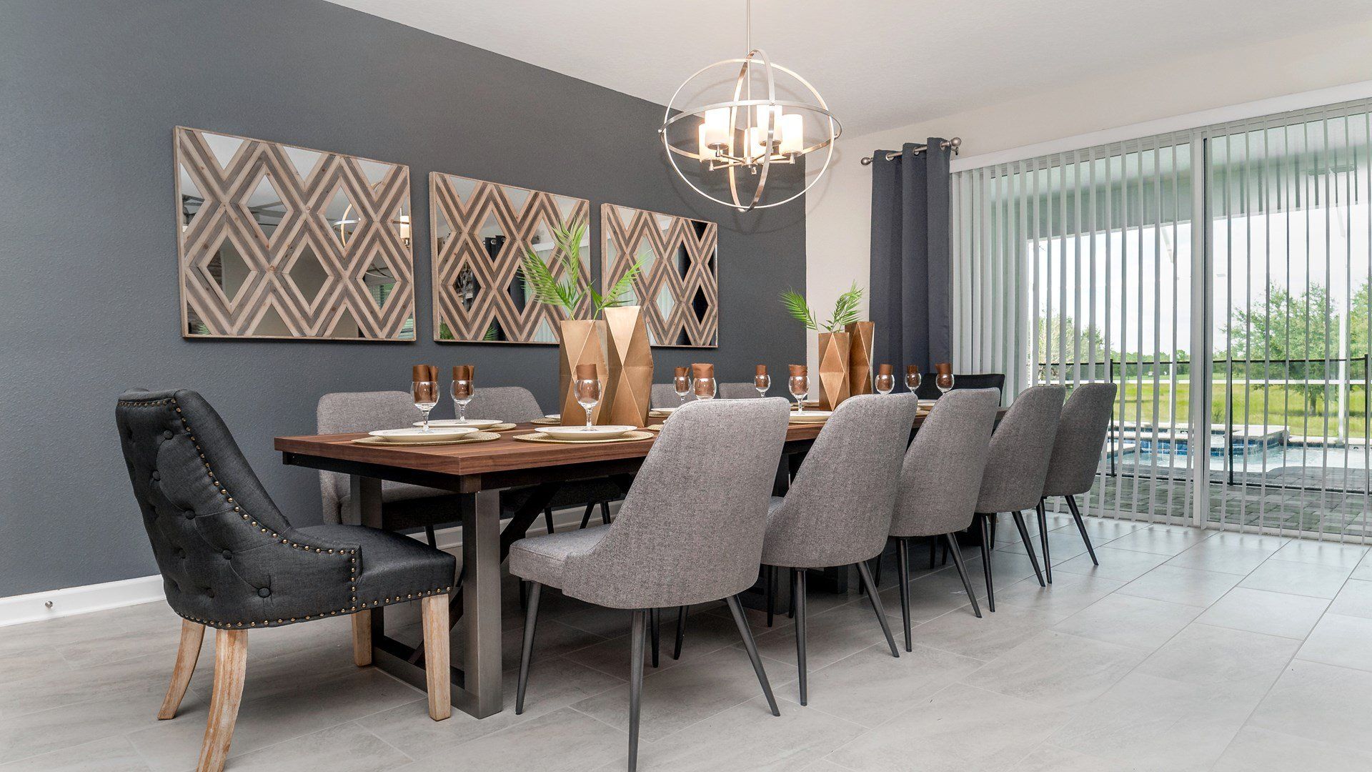 Stylish dining area for 12 with modern decor and poolside views!