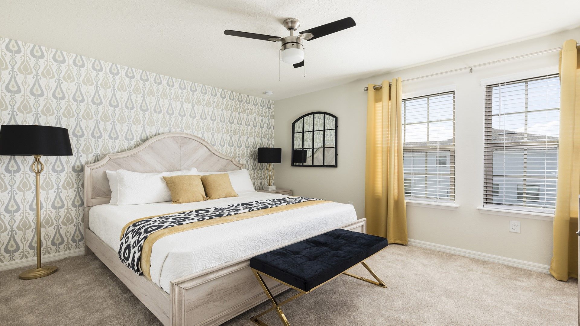 Serene bedroom with elegant decor, cozy bedding, and soft lighting for a restful and stylish retreat.