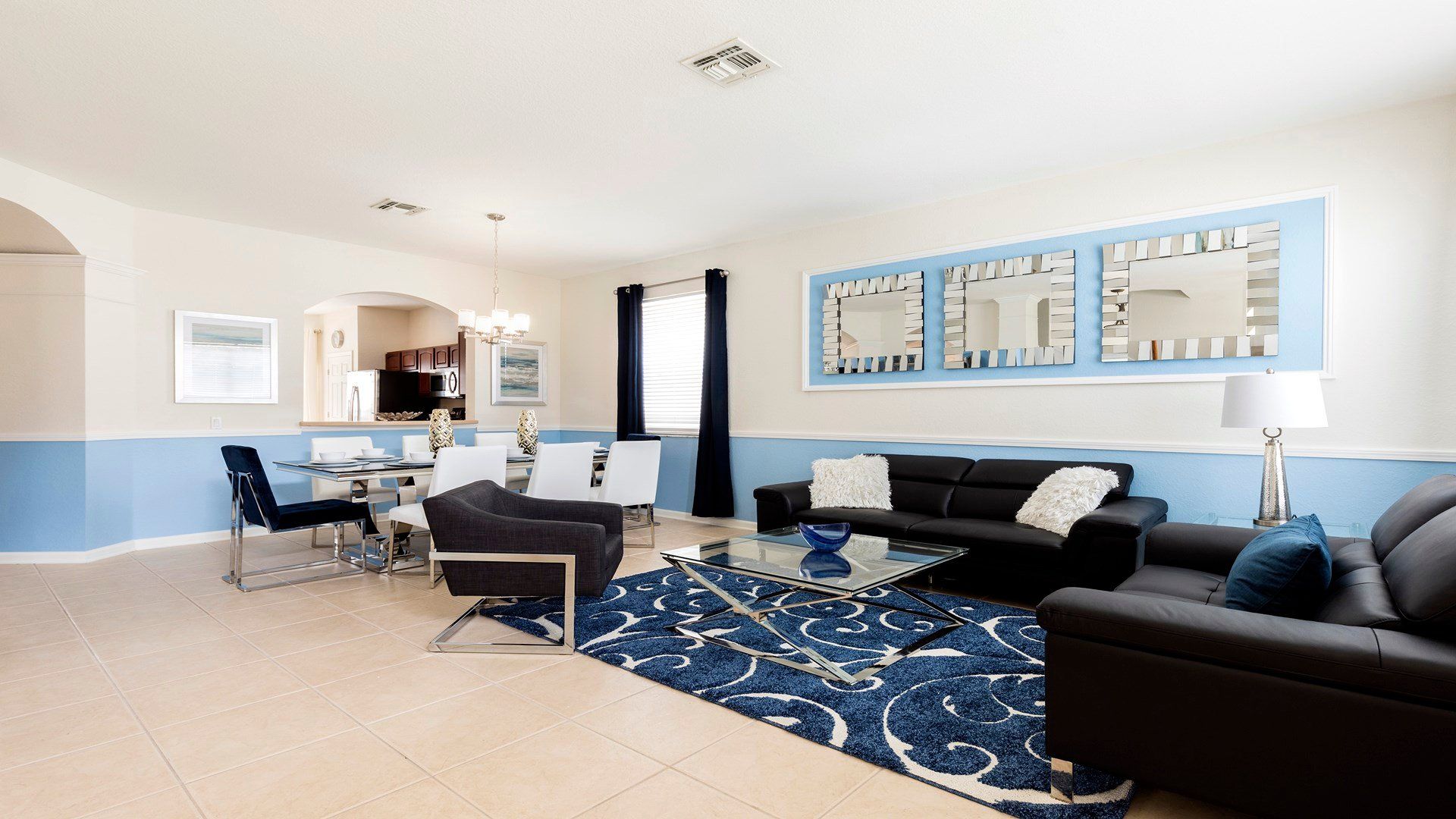 Elegant open-concept living and dining area with chic decor and modern furnishings!