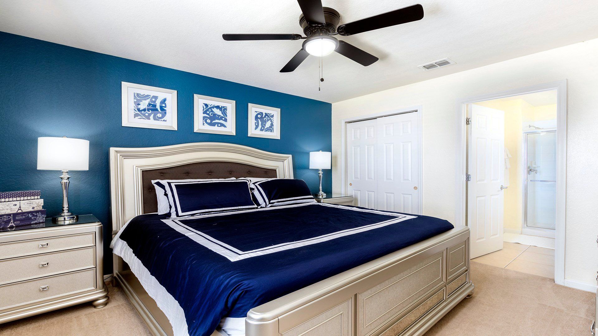 The spacious second bedroom with a comfortable king bed and en suite bathroom