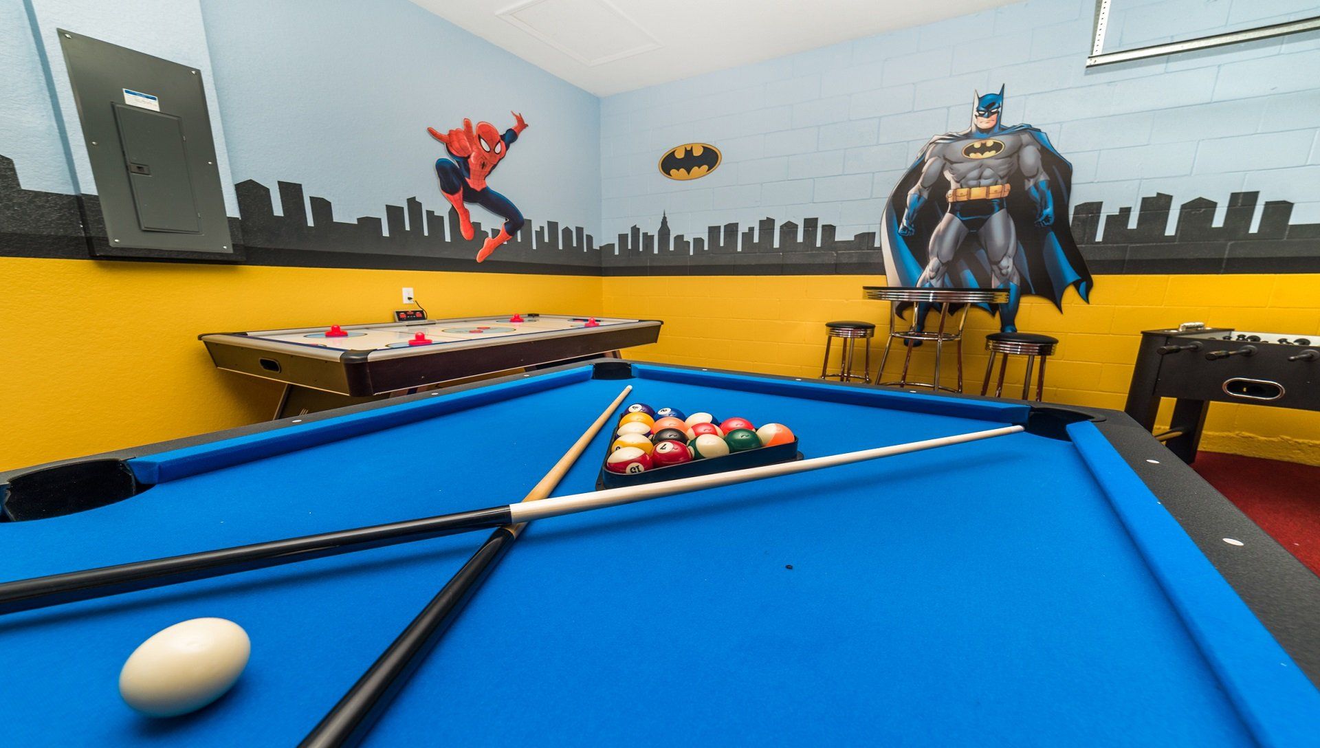 The game room is stylishly furnished with cool theme