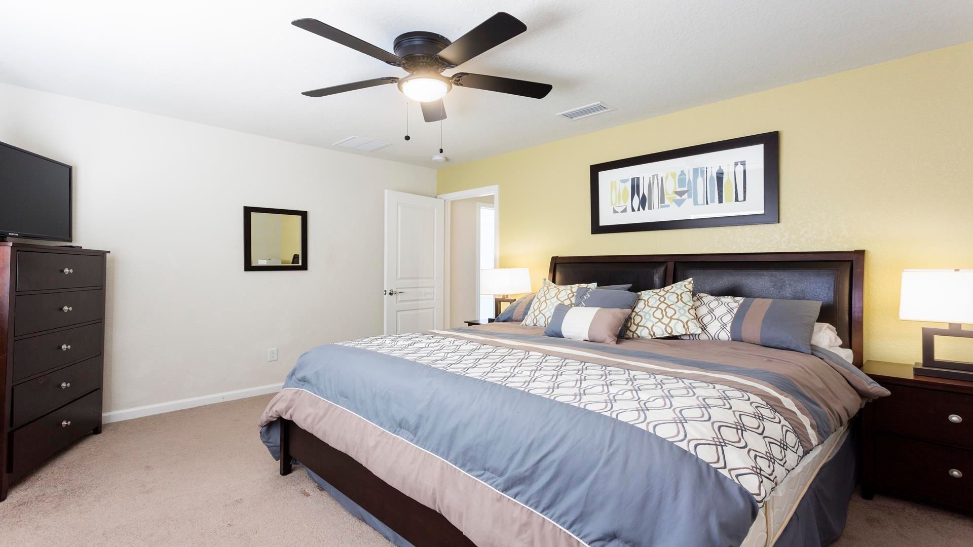 The spacious bedroom with a comfortable king bed