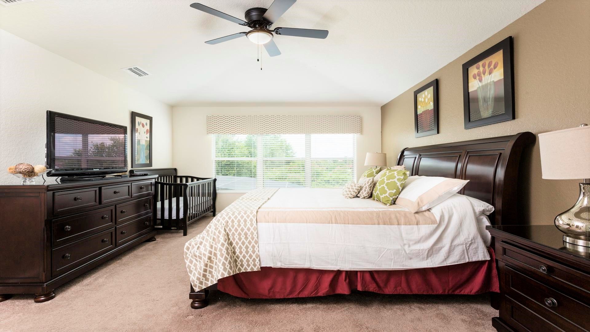 The master bedroom with a luxuriously large king bed