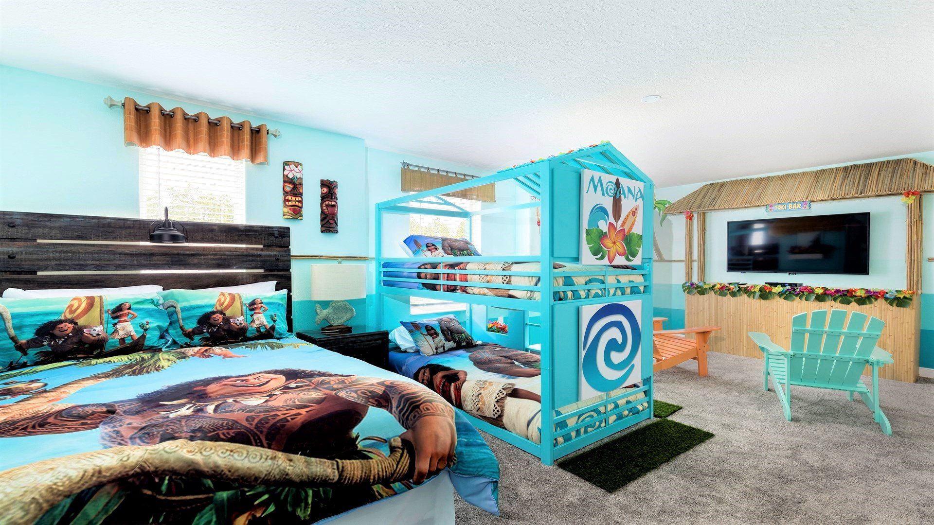 Tropical Moana-themed room with bunk beds, Tiki decor, and fun vibes