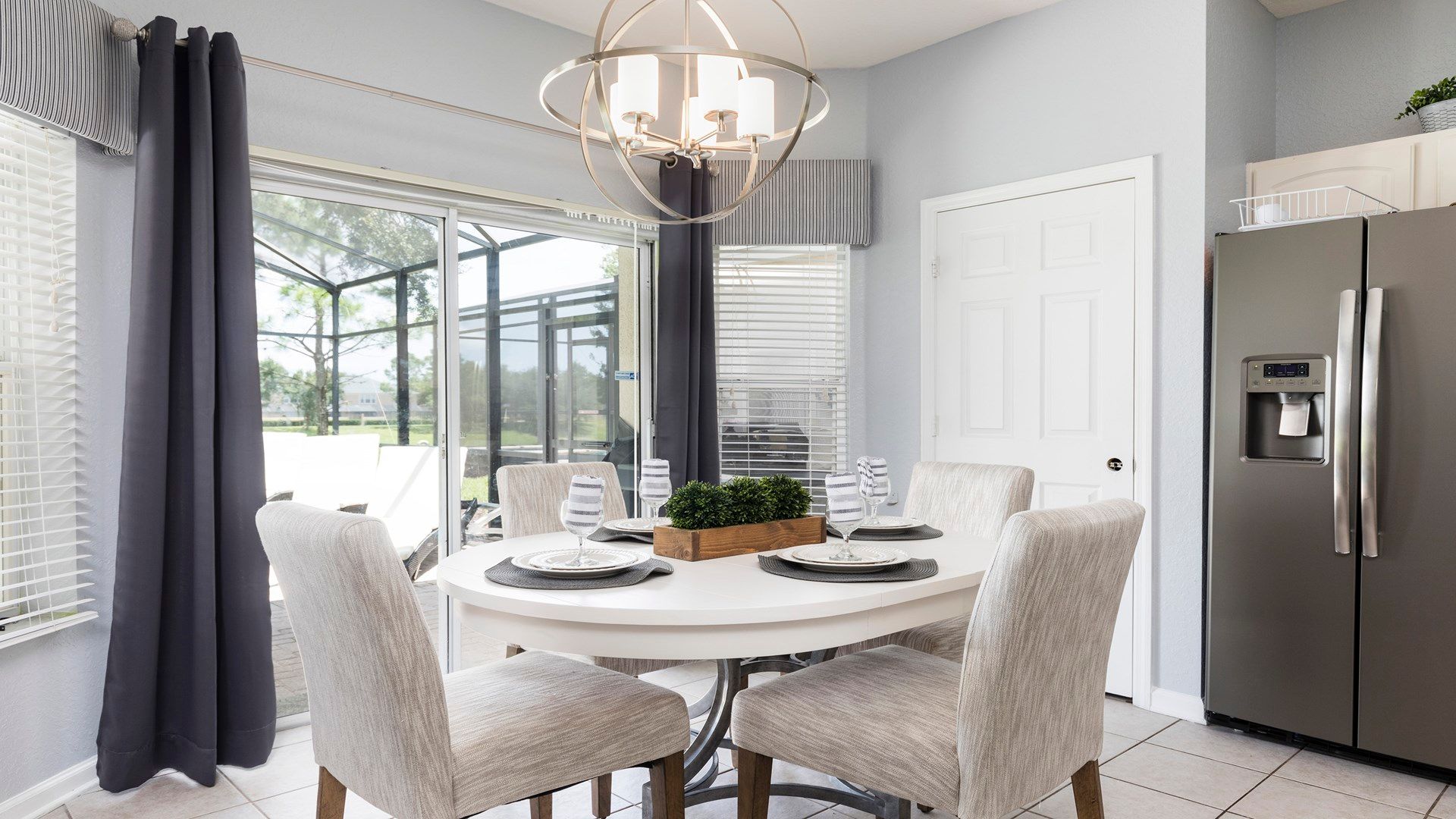 Charming breakfast nook with stylish decor and patio views for a relaxing meal!