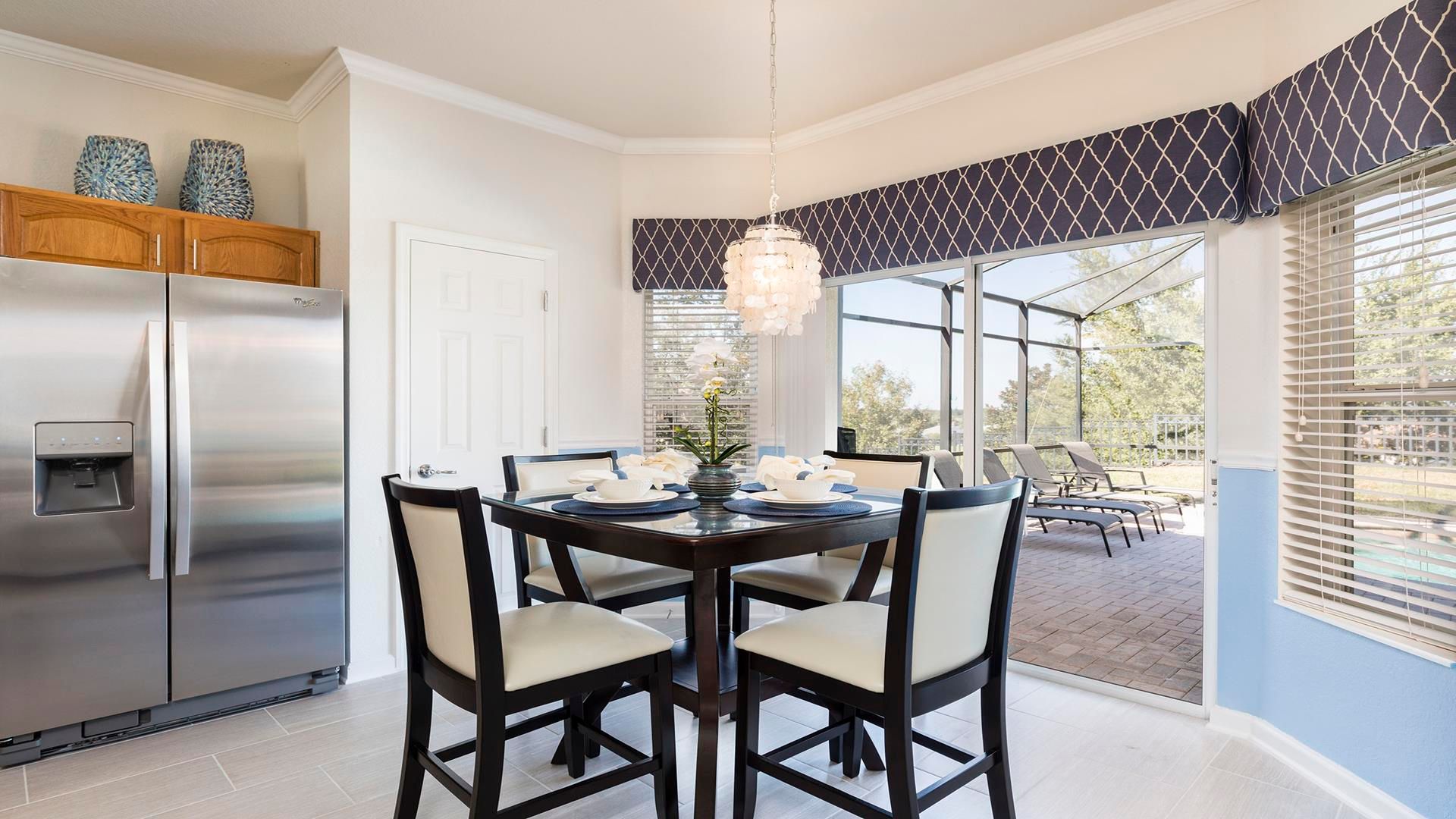 Sit up at the breakfast bar and keep the chef company.