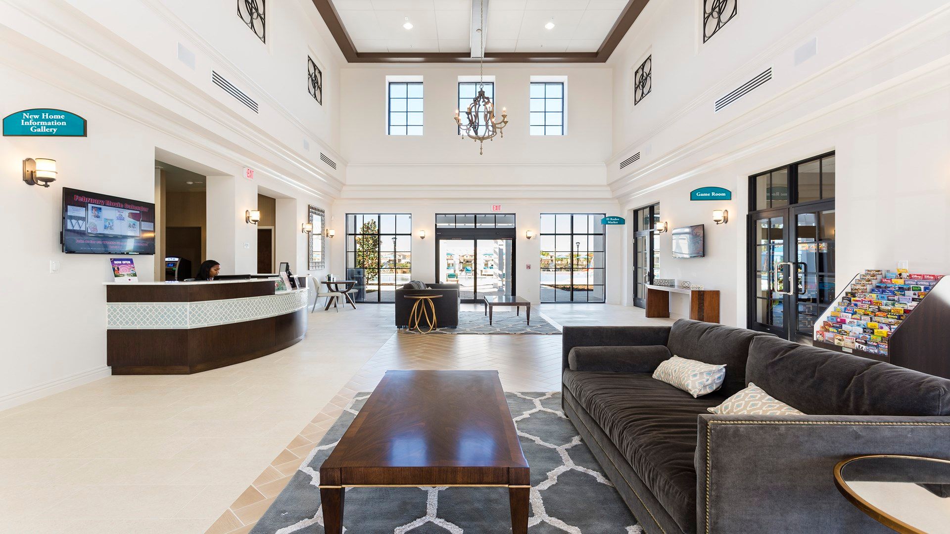 Elegant clubhouse lobby with high ceilings and cozy seating areas