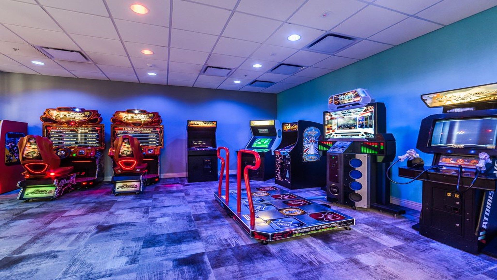 Enjoy thrilling games in the vibrant on-site arcade room