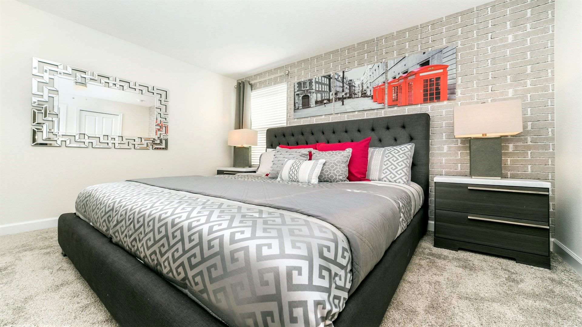 Chic bedroom with modern accents, a comfy king bed, and bold decor!